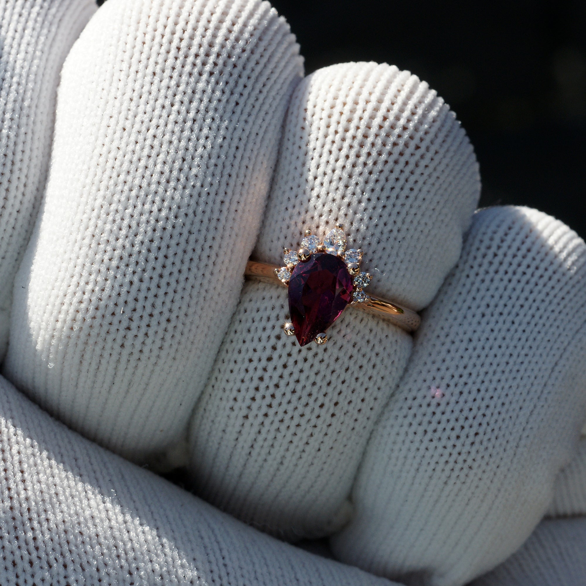 Rhodolite garnet pear half diamond halo ring in rose gold