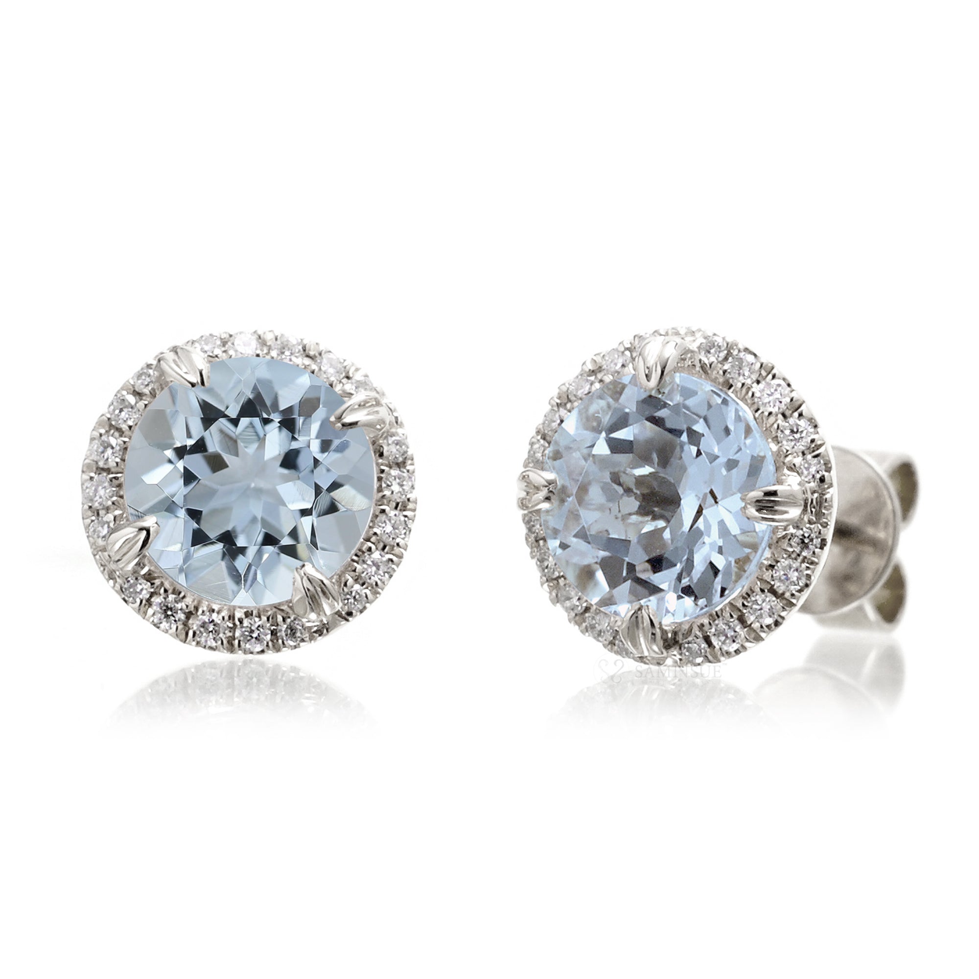 Round aquamarine stud earrings with diamond halo in white gold