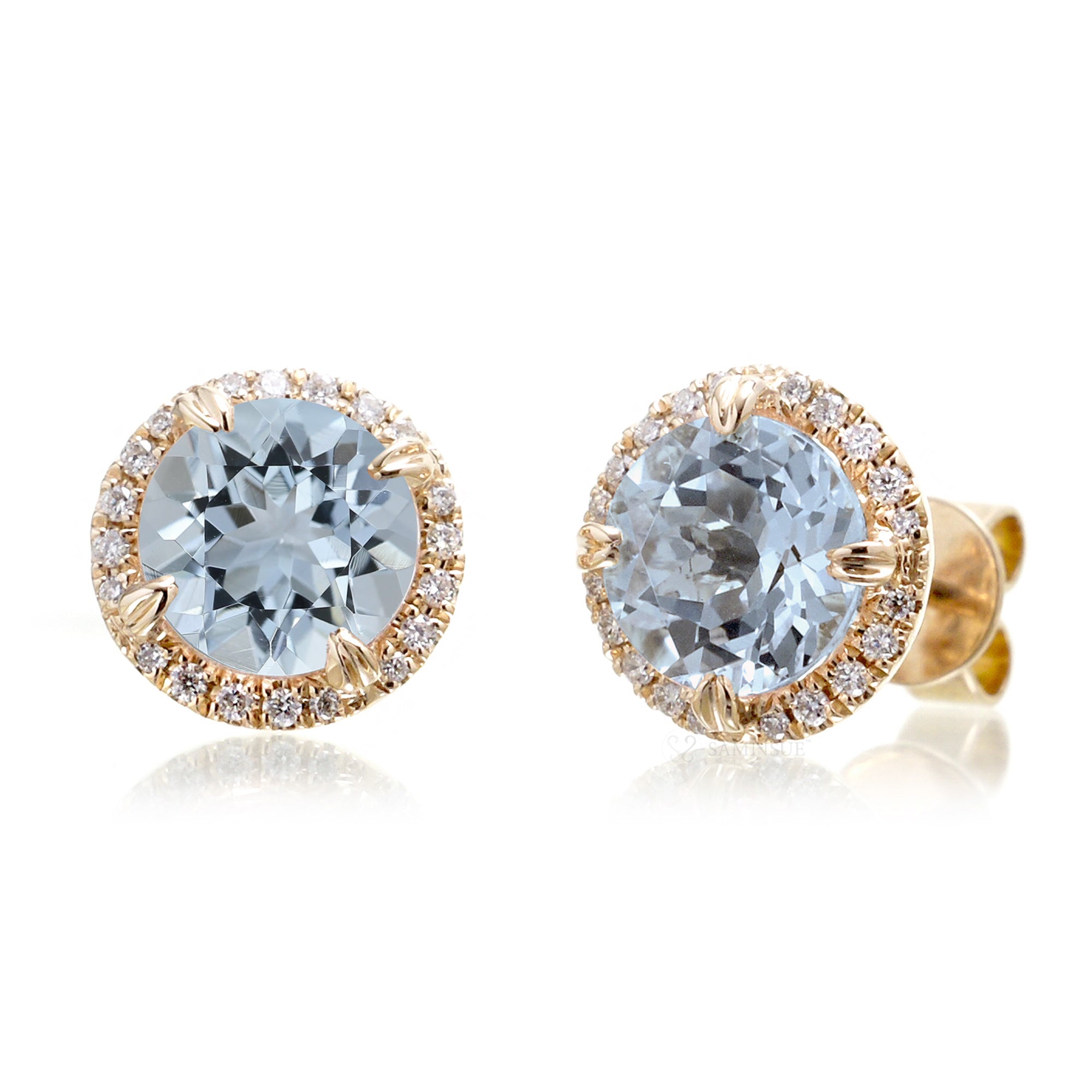 Round aquamarine stud earrings with diamond halo in yellow gold