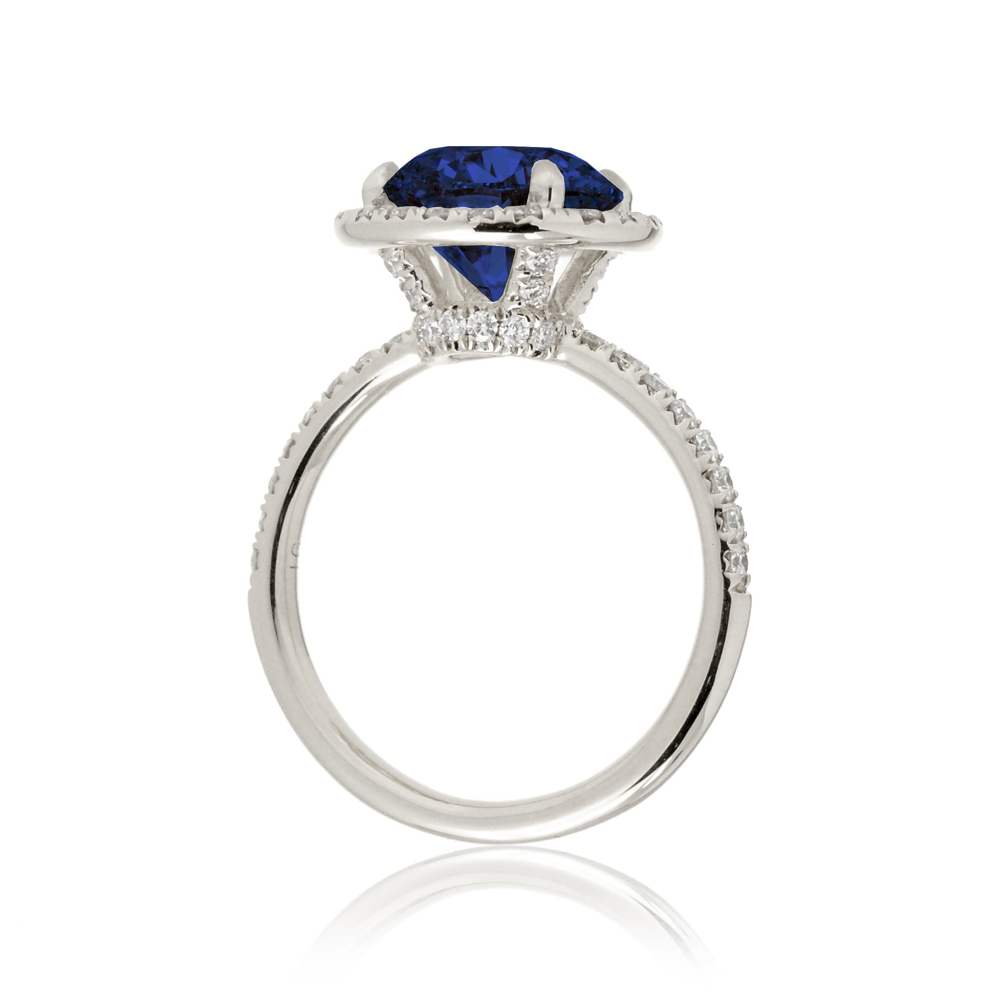 Round blue sapphire engagement ring the Drenched white gold side view