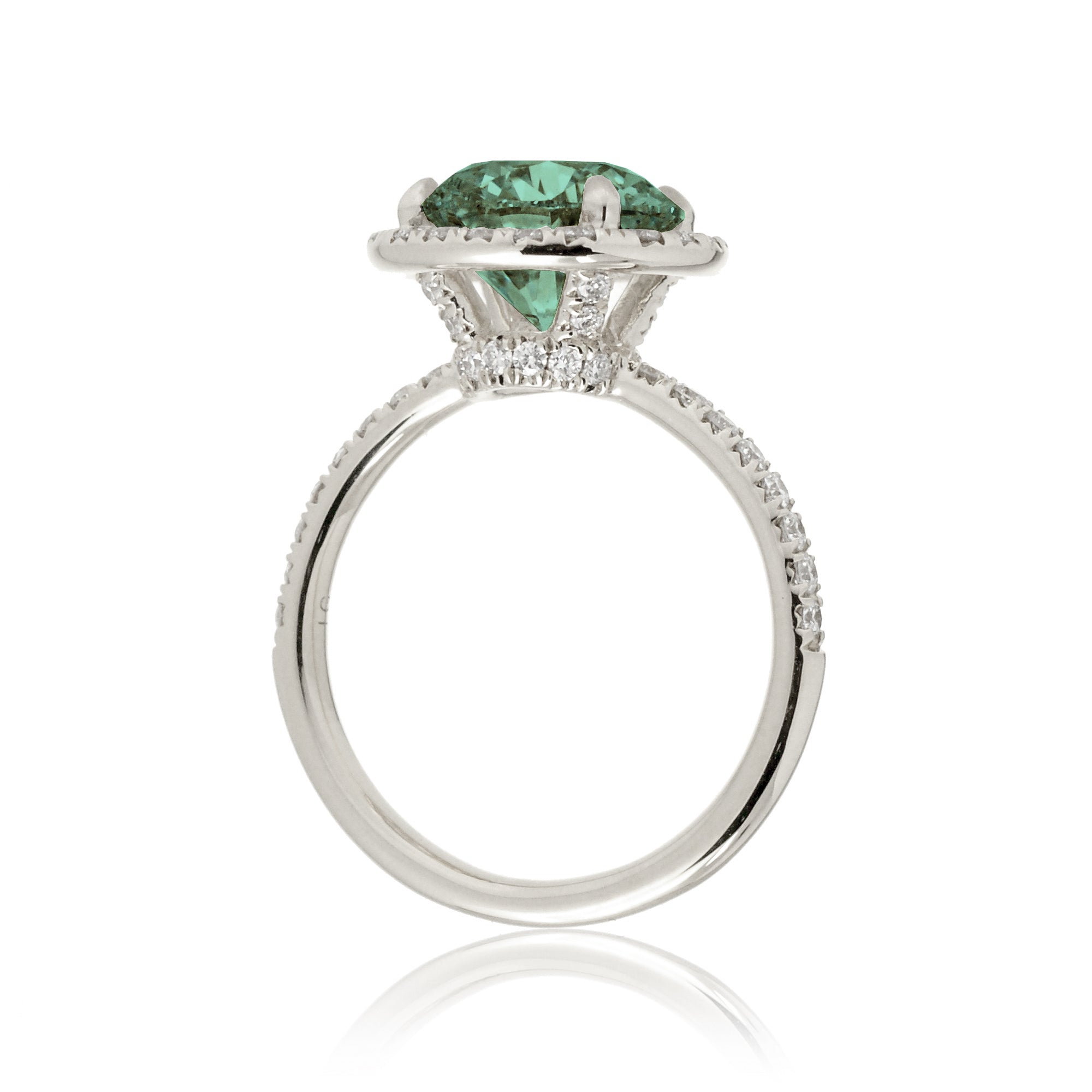 Round cut green sapphire engagement ring the Drenched white gold side view