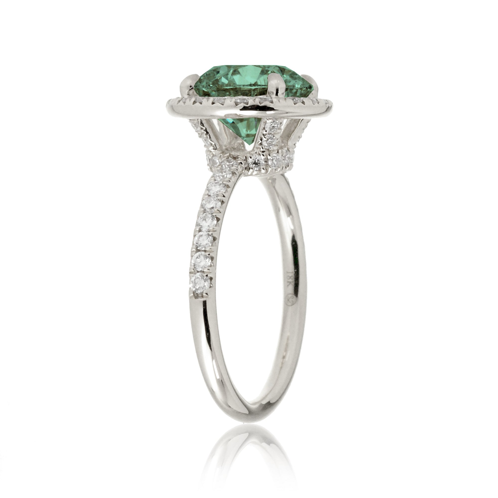 Round cut green sapphire engagement ring the Drenched white gold profile view