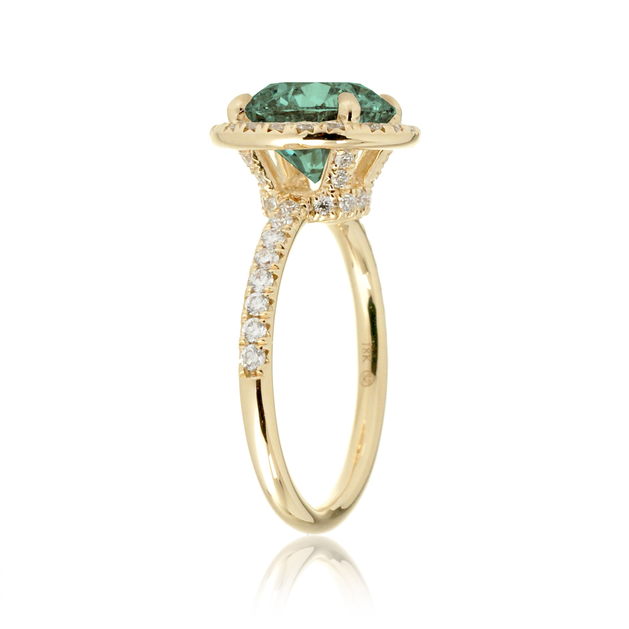 Round cut green sapphire engagement ring the Drenched yellow gold profile view