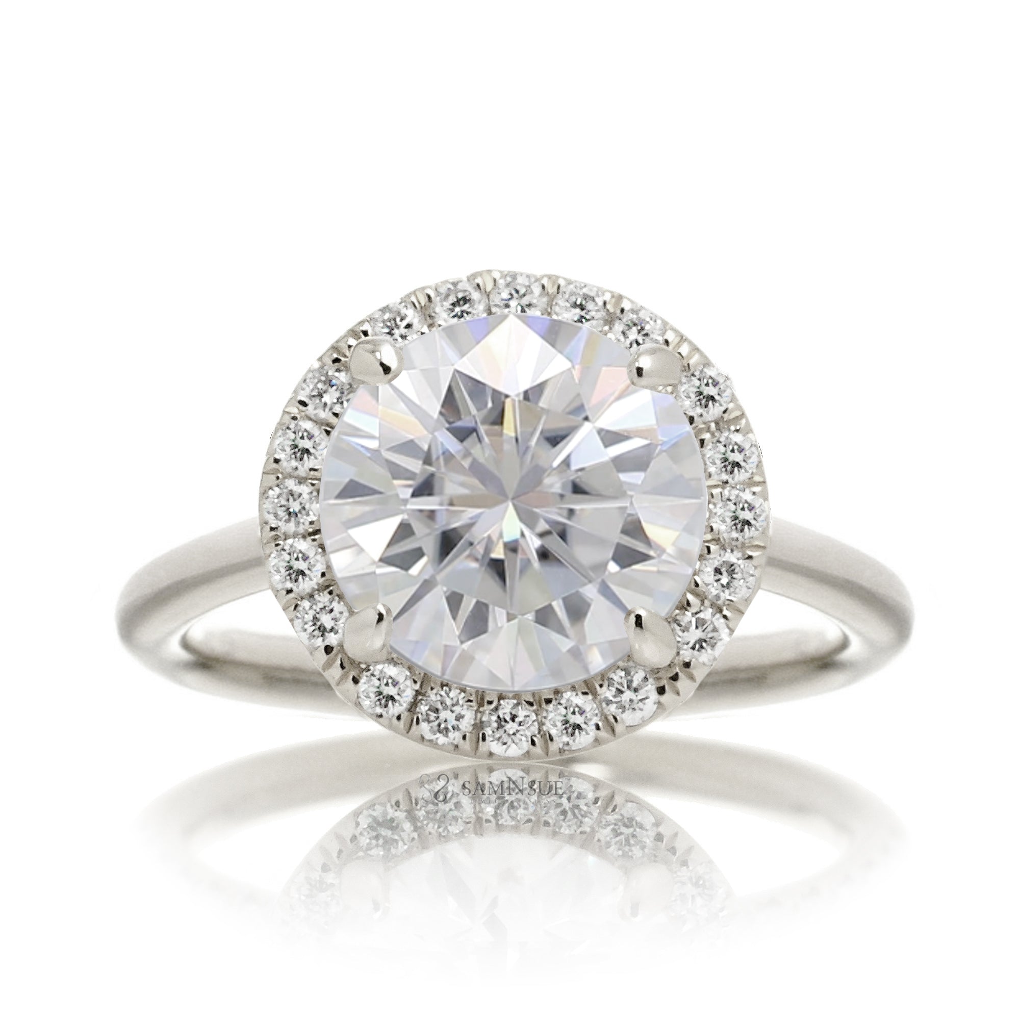 Round brilliant cut moissanite engagement ring with a diamond halo the Drenched white gold solid band