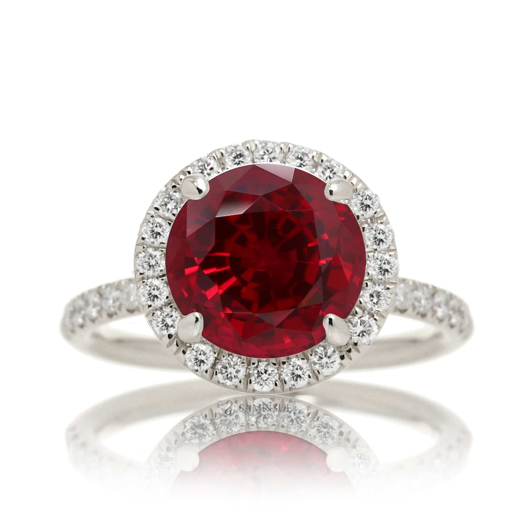 Ruby engagement ring round cut the Drenched white gold