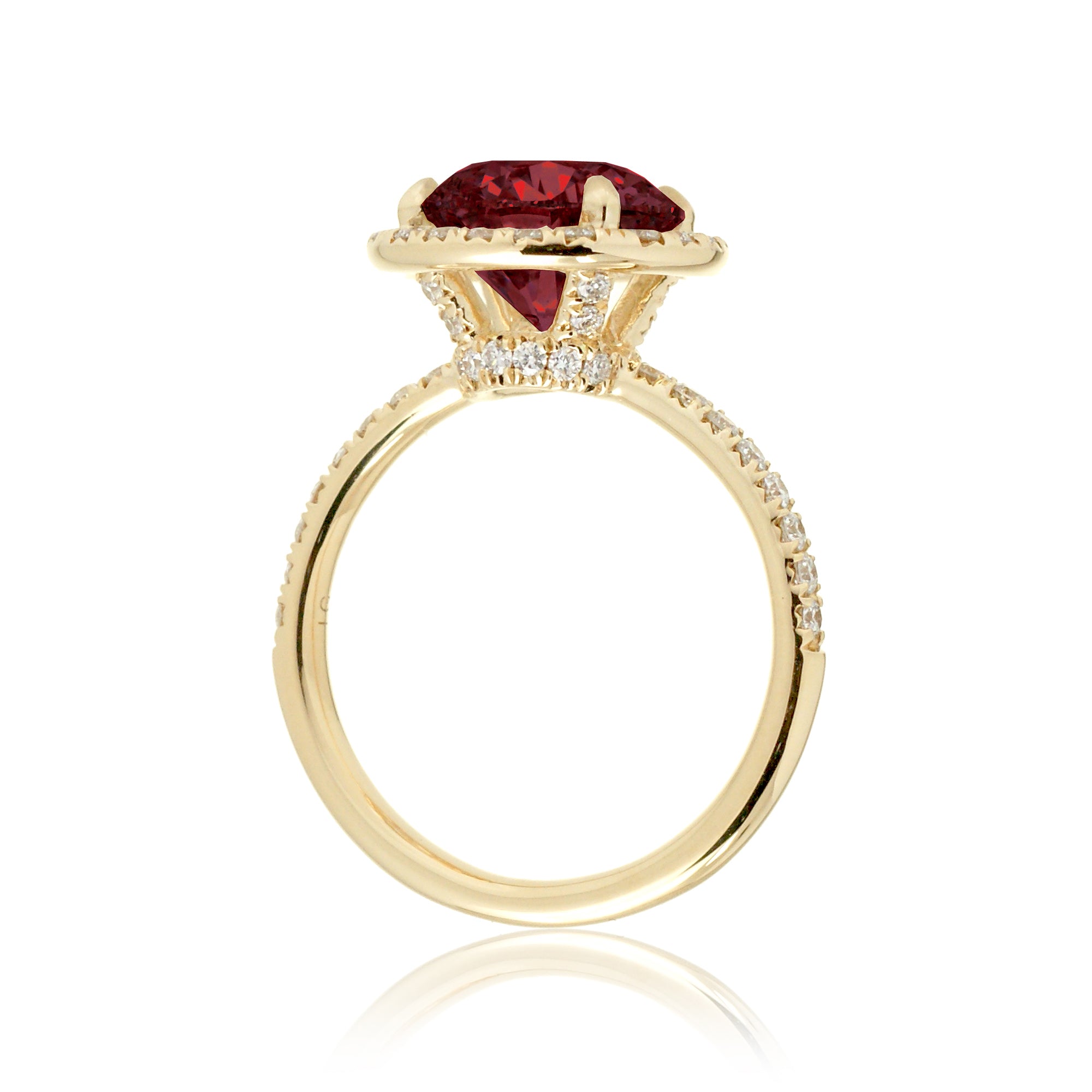 Ruby engagement ring round cut the Drenched yellow gold side view