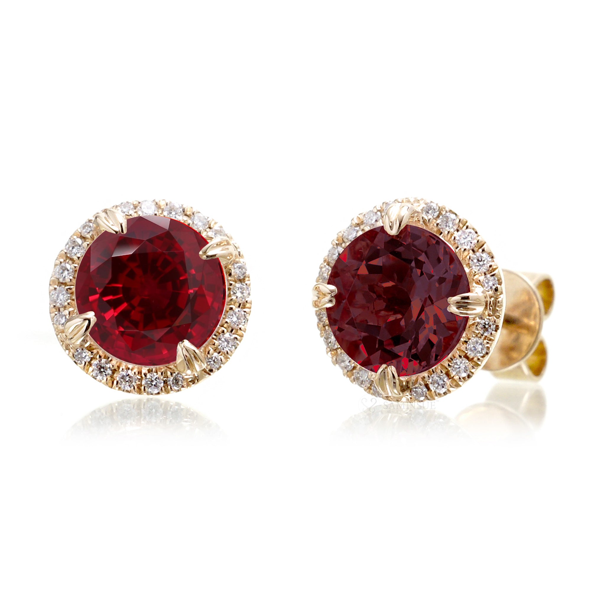 Round ruby stud earrings with diamond halo in yellow gold