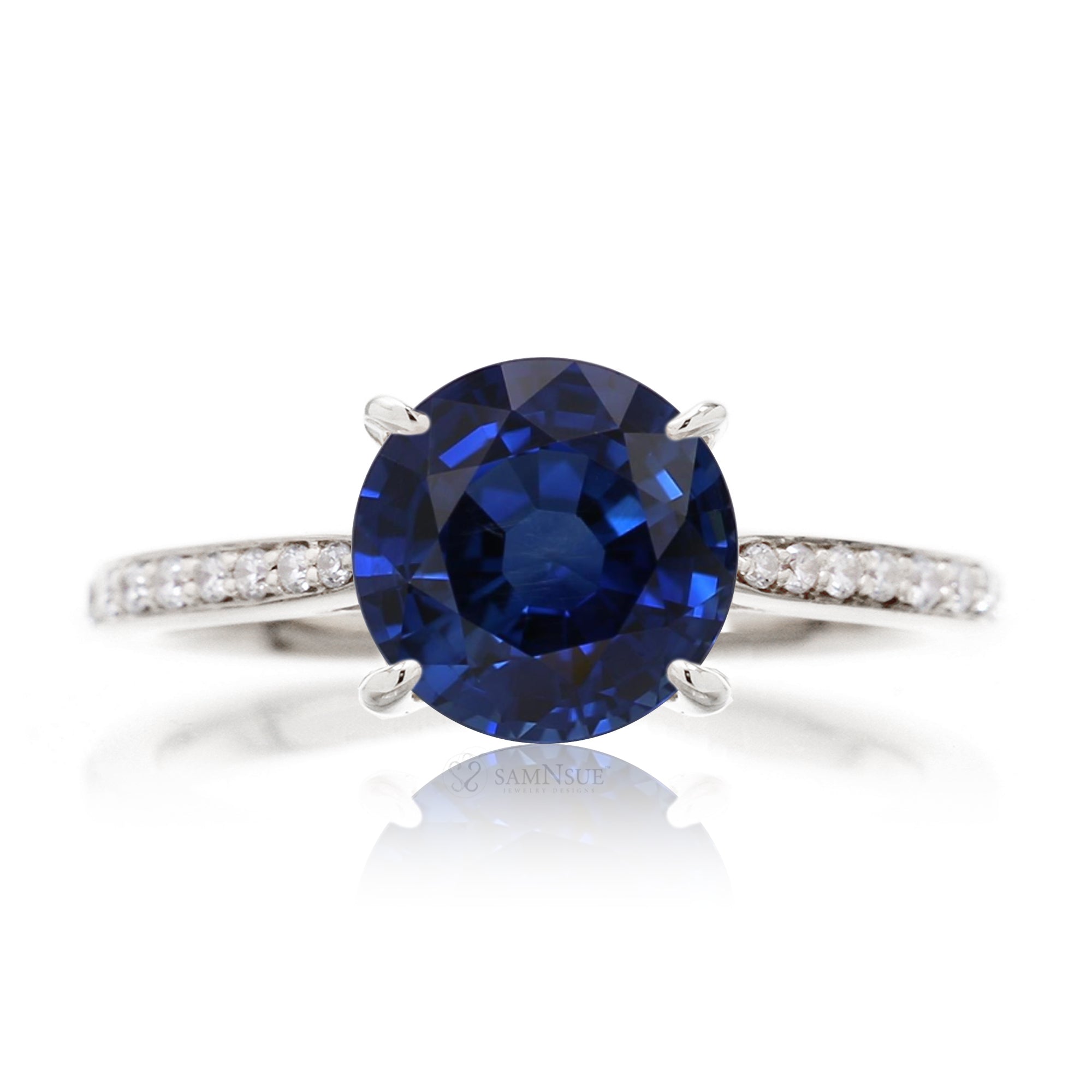 Round blue sapphire engagement ring with diamonds on the band - the Emily white gold