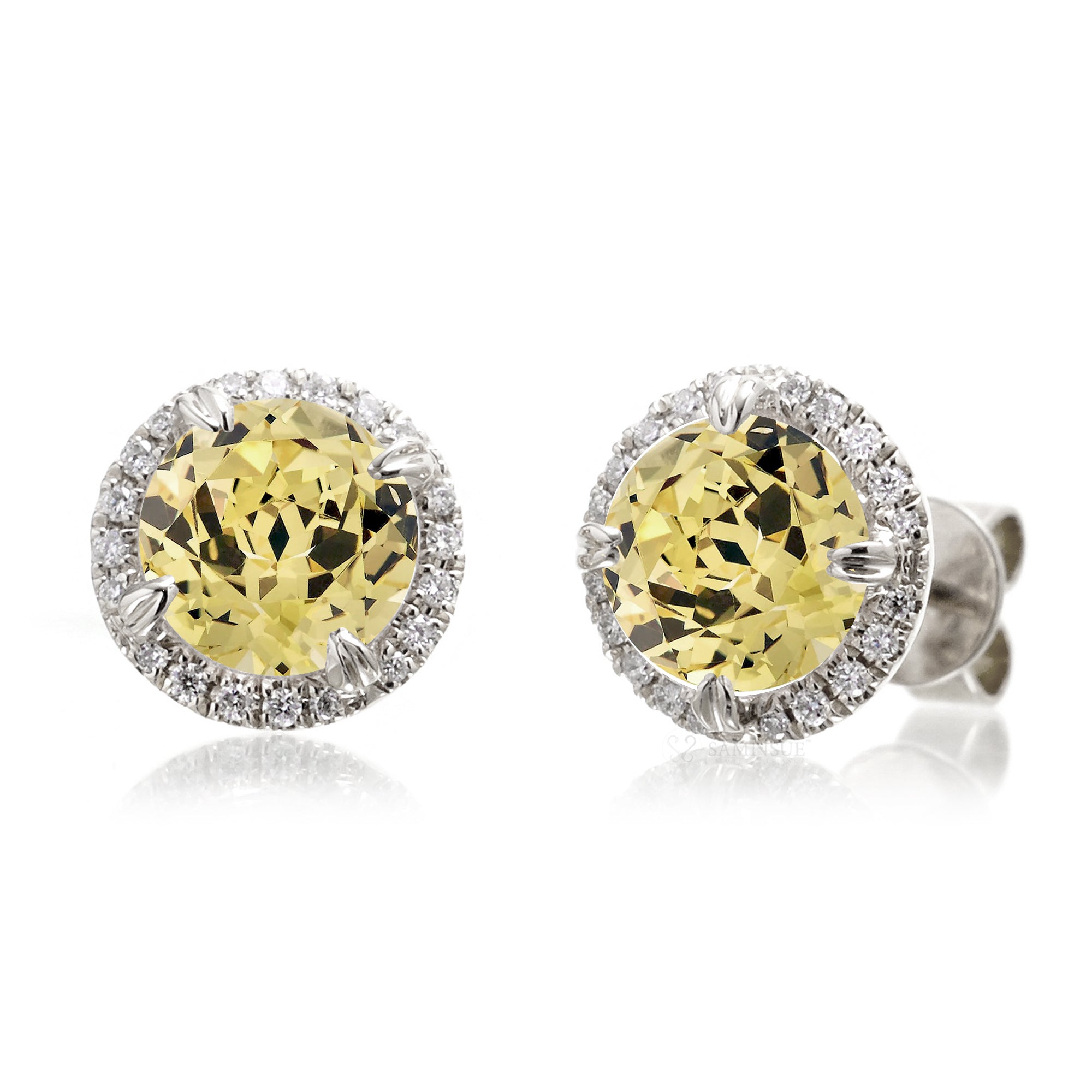 Yellow sapphire stud earrings with diamond halo in white gold