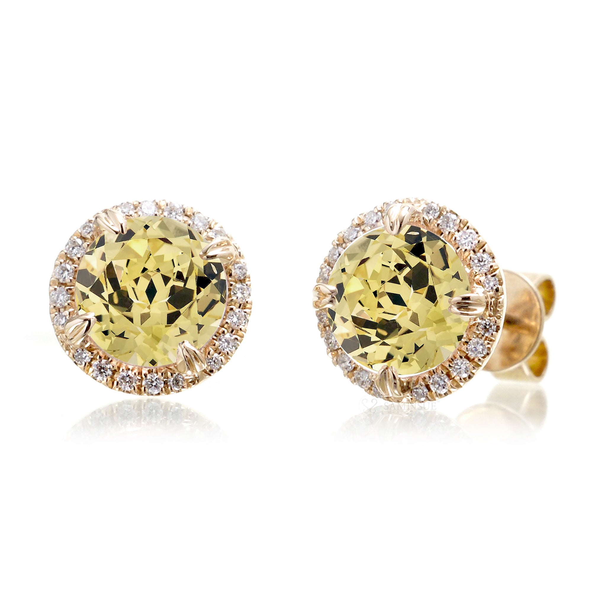 Yellow sapphire stud earrings with diamond halo in yellow gold