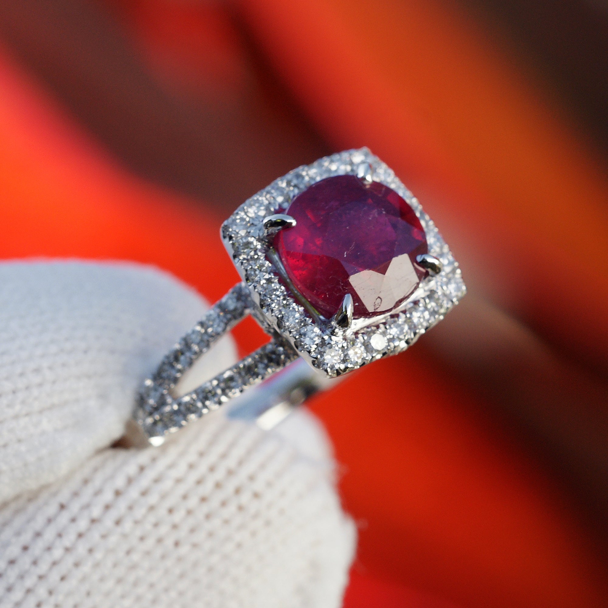 Round cut ruby cushion diamond halo split band ring in white gold