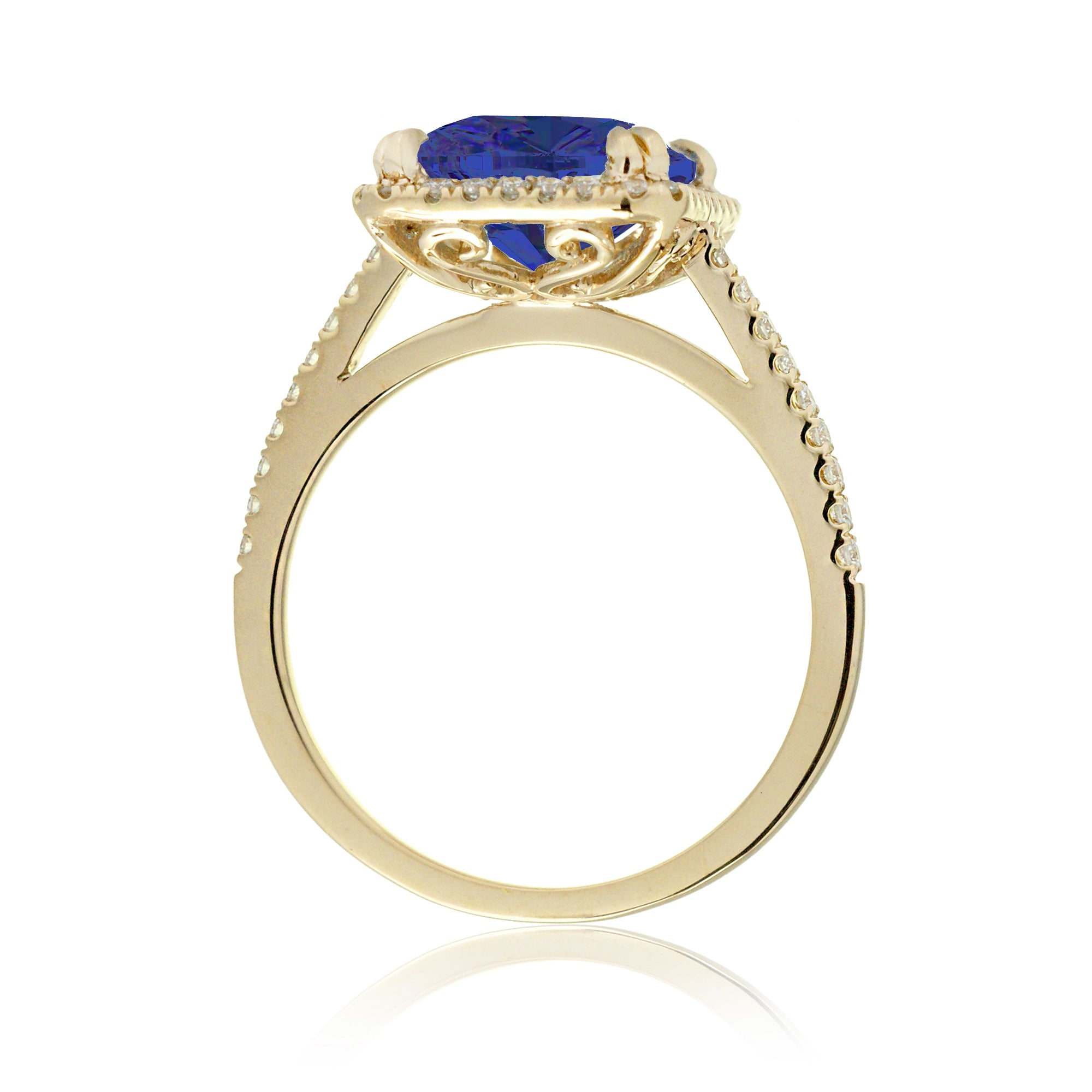 Cushion cut blue sapphire diamond halo ring The Signature in yellow gold side view