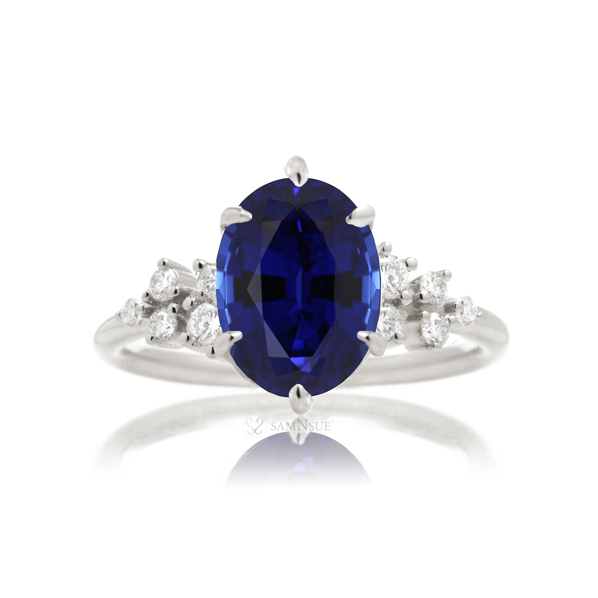 Blue sapphire oval cut solitaire engagement ring in white gold