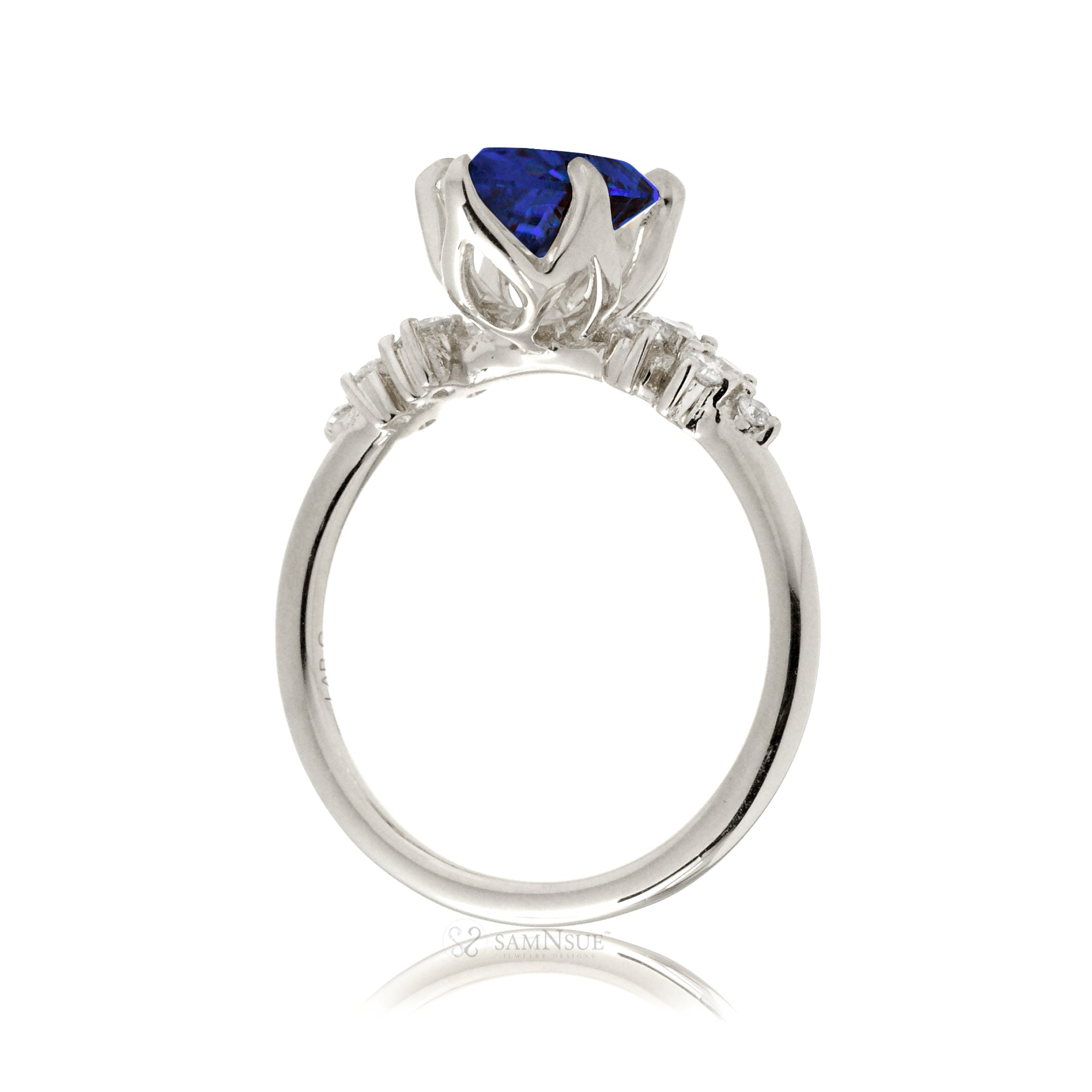 Blue sapphire oval cut solitaire engagement ring in white gold