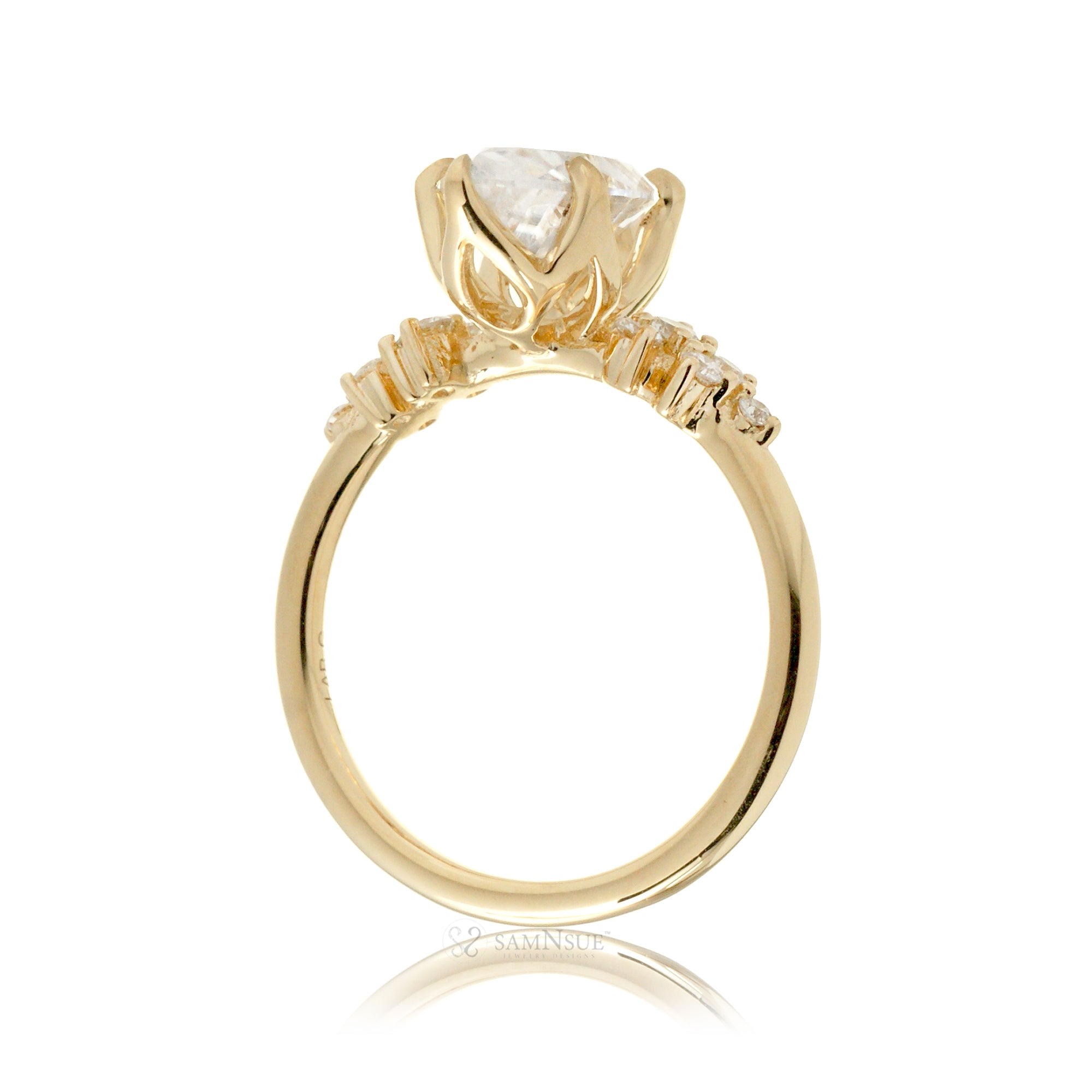 Oval cut diamond engagement ring with yellow gold