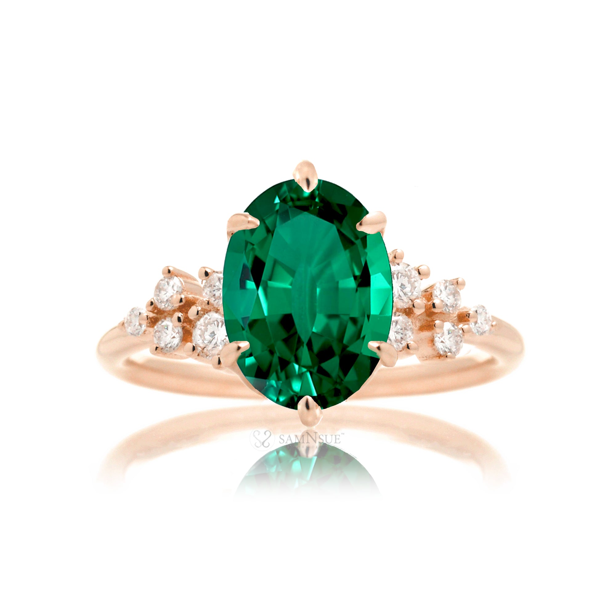 Oval emerald ring with diamond accent on rose  gold