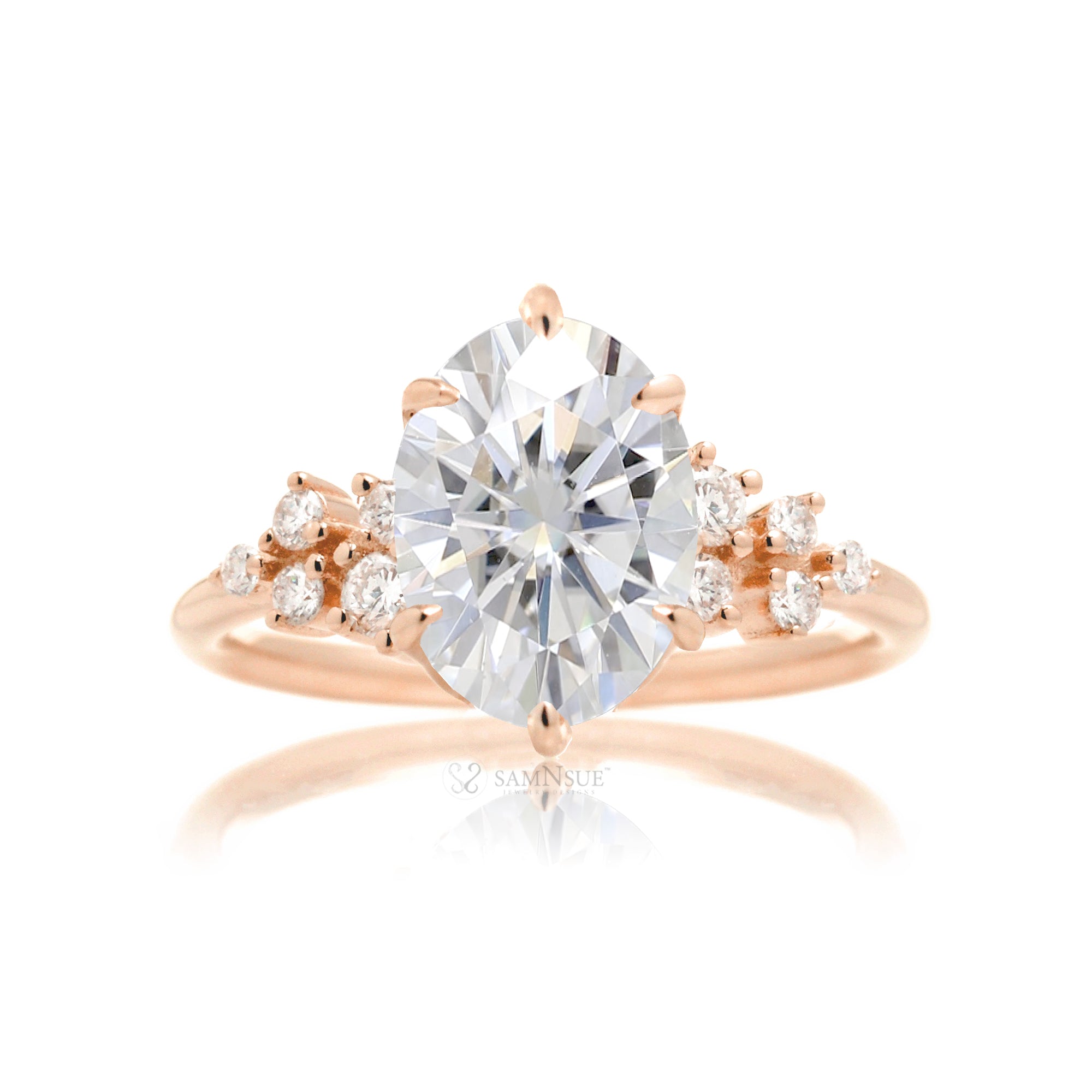 Oval moissanite ring with side diamond constellation in the Stella rose gold ring