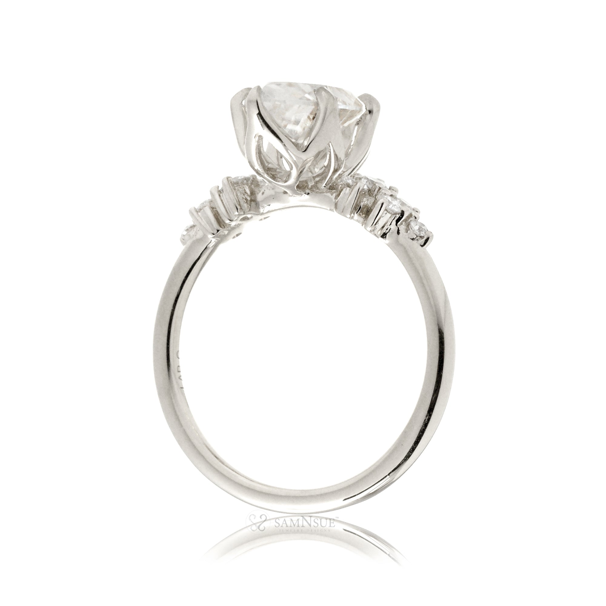 Oval moissanite ring with side diamond constellation in the Stella white gold ring