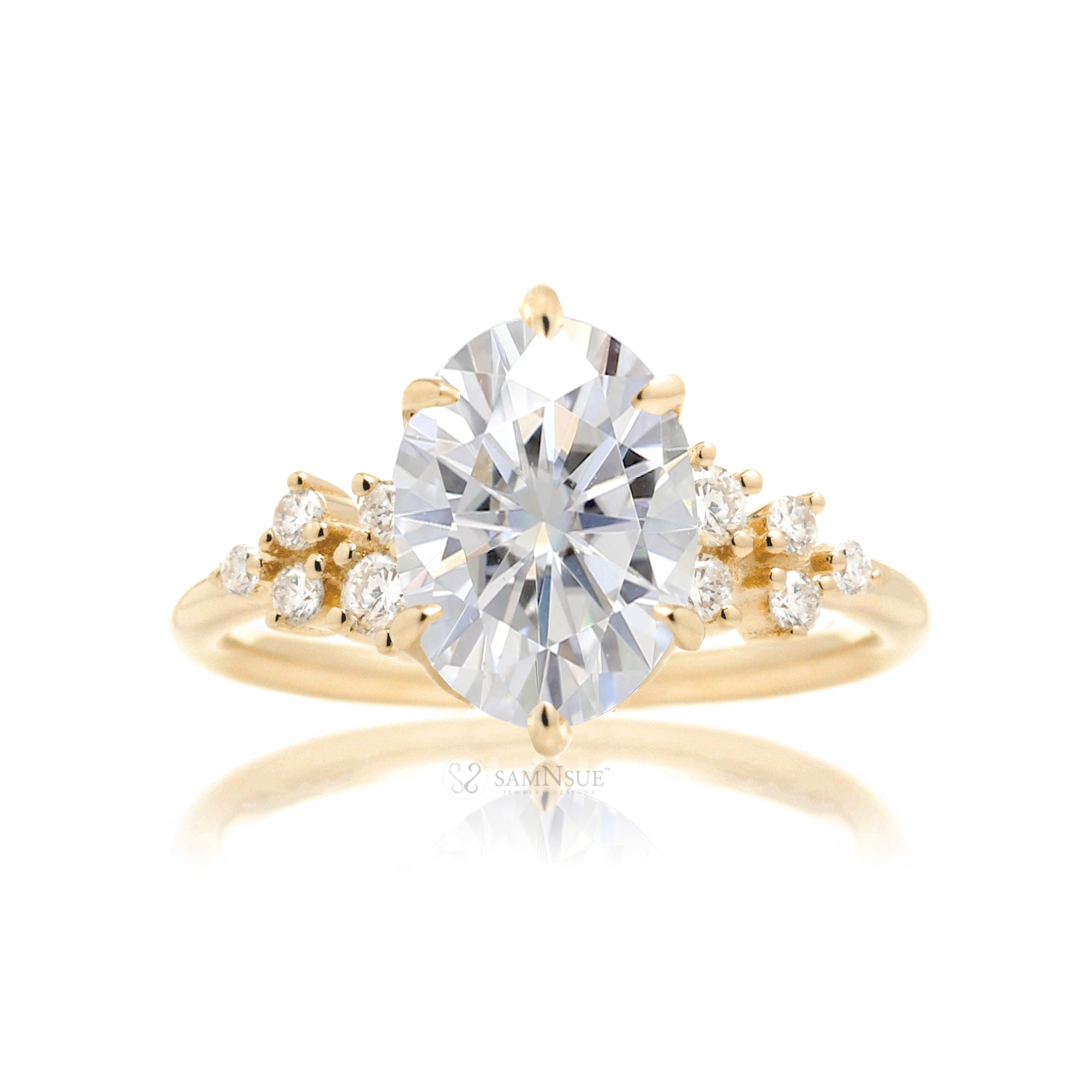 Oval moissanite ring with side diamond constellation in the Stella yellow gold ring