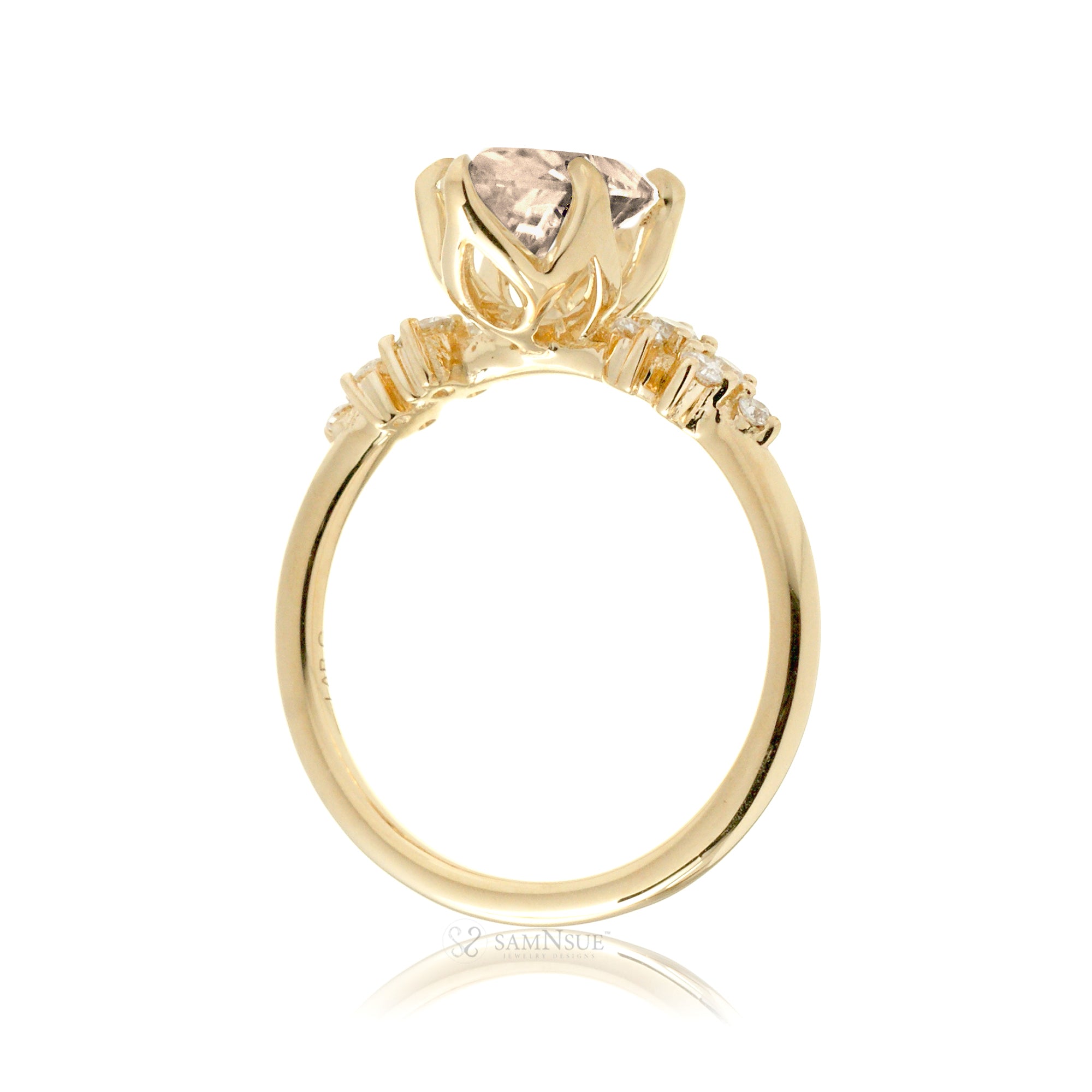 Oval cut morganite ring with diamond accent in yellow gold