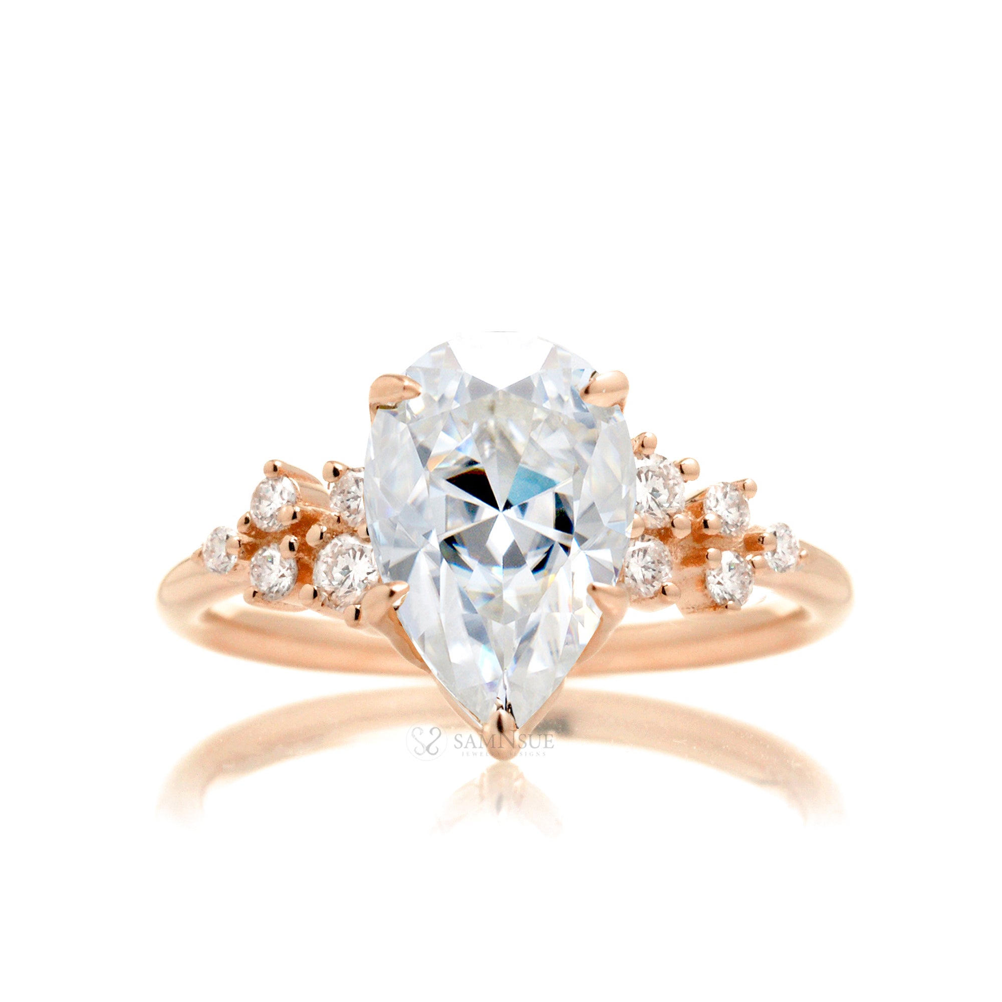 Pear moissanite diamond engagement ring the Stella constellation rose gold ring