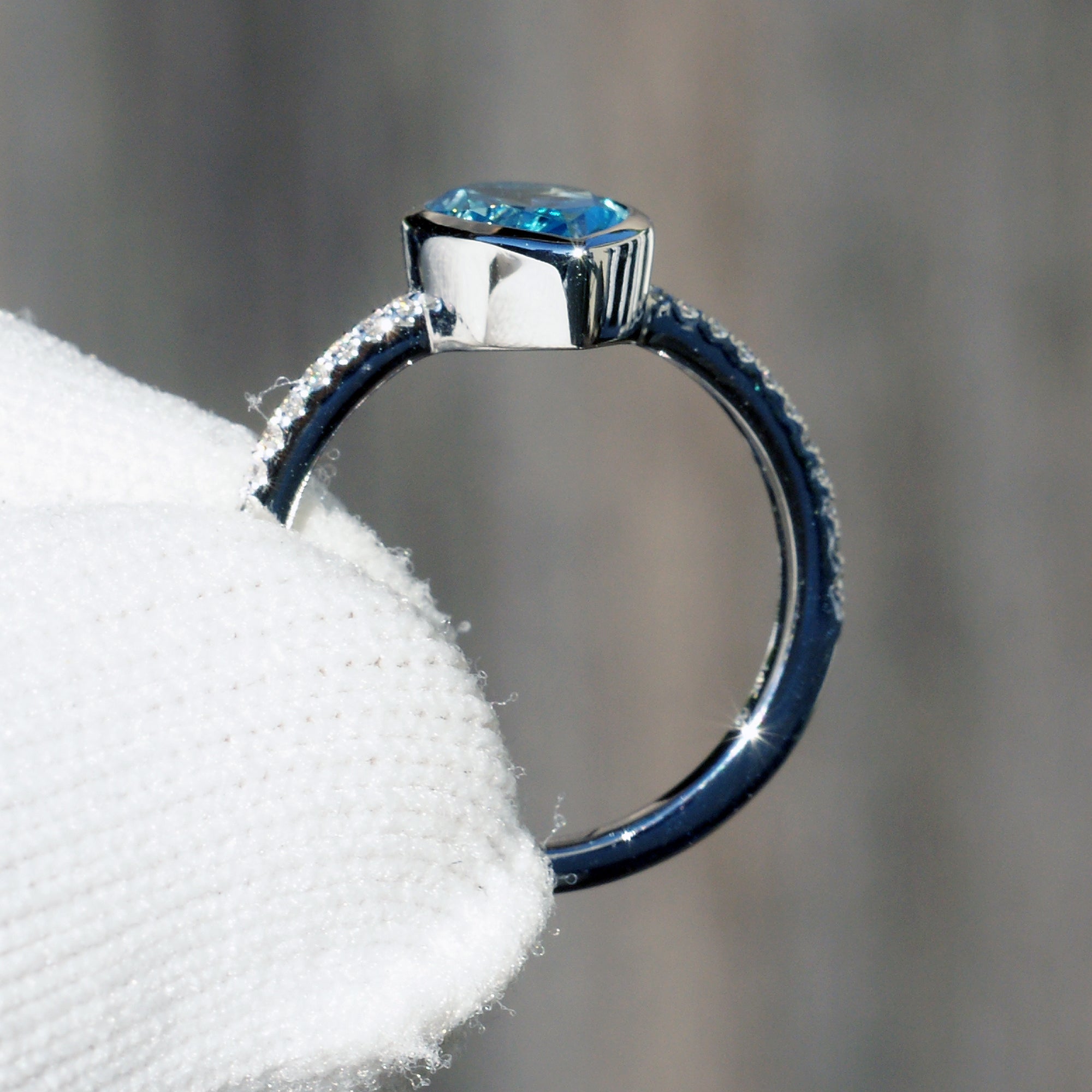 Blue topaz ring pear cut bezel set diamond band ring white gold