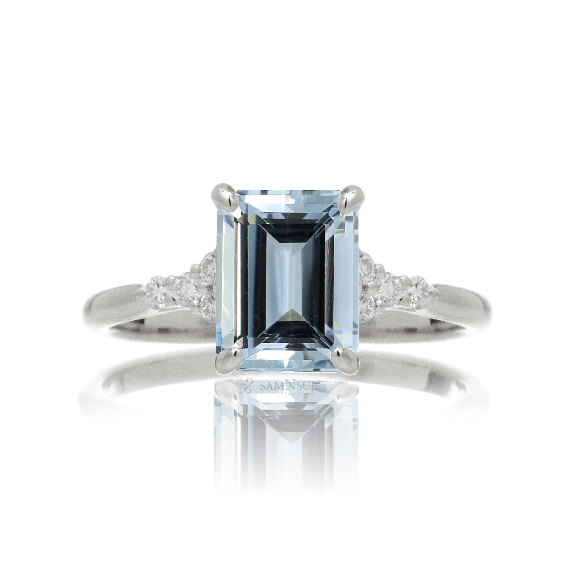 Aquamarine ring emerald cut with solid rounded band in white gold