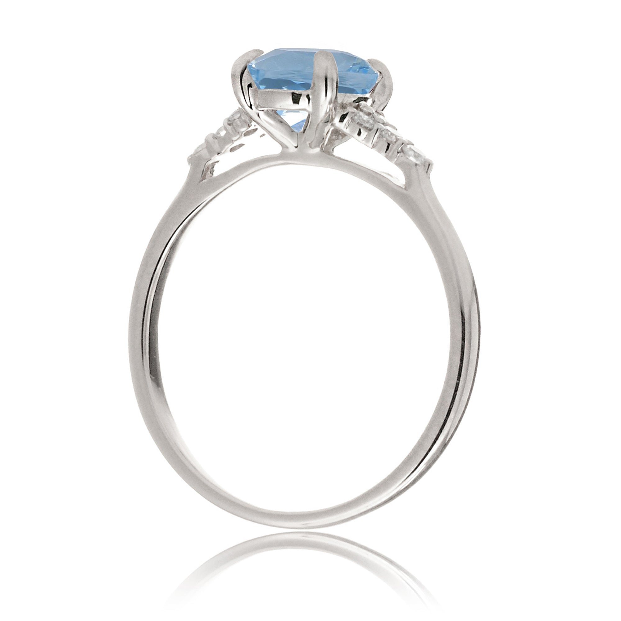 Aquamarine ring emerald cut with solid rounded band in white gold