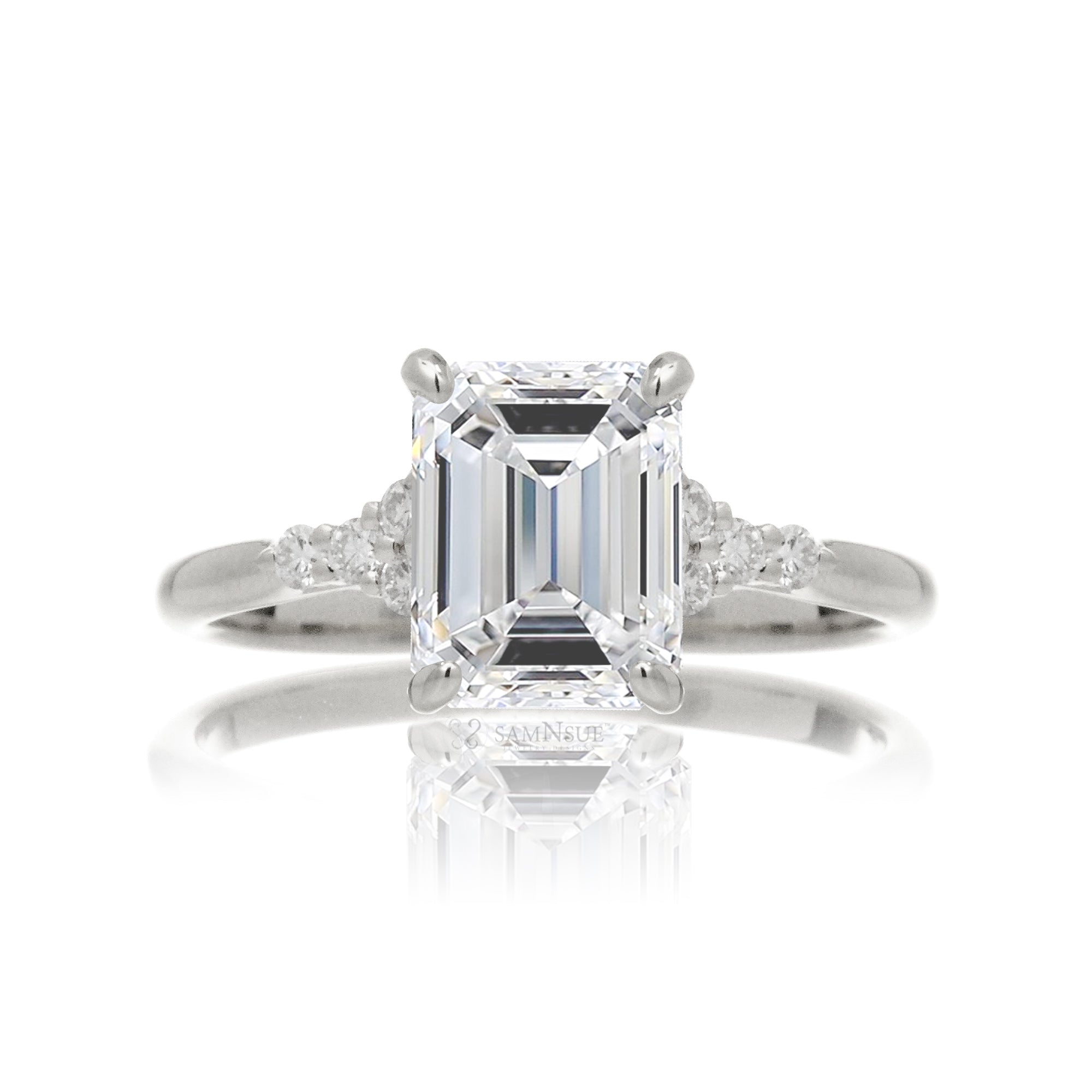 Emerald step cut diamond engagement ring in white gold