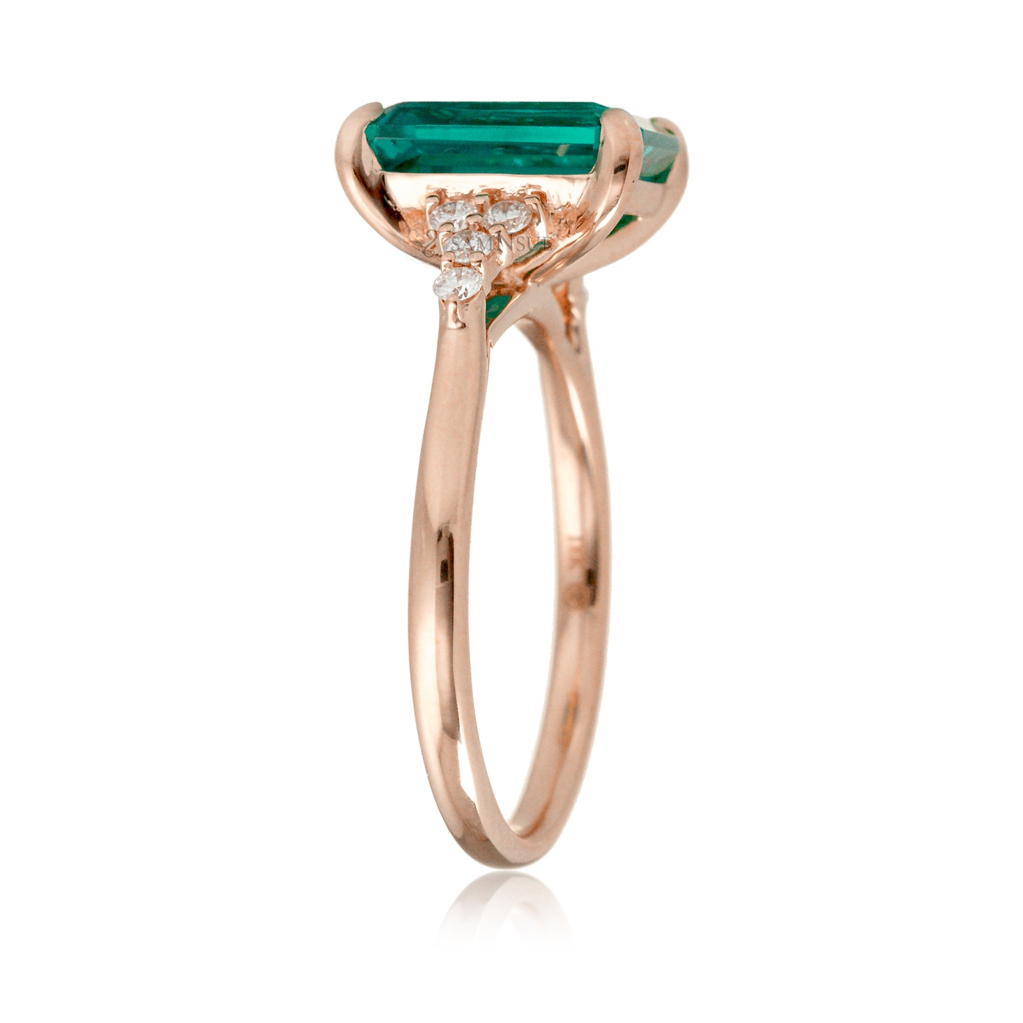 Green emerald engagement three stone ring in rose gold the Chloe