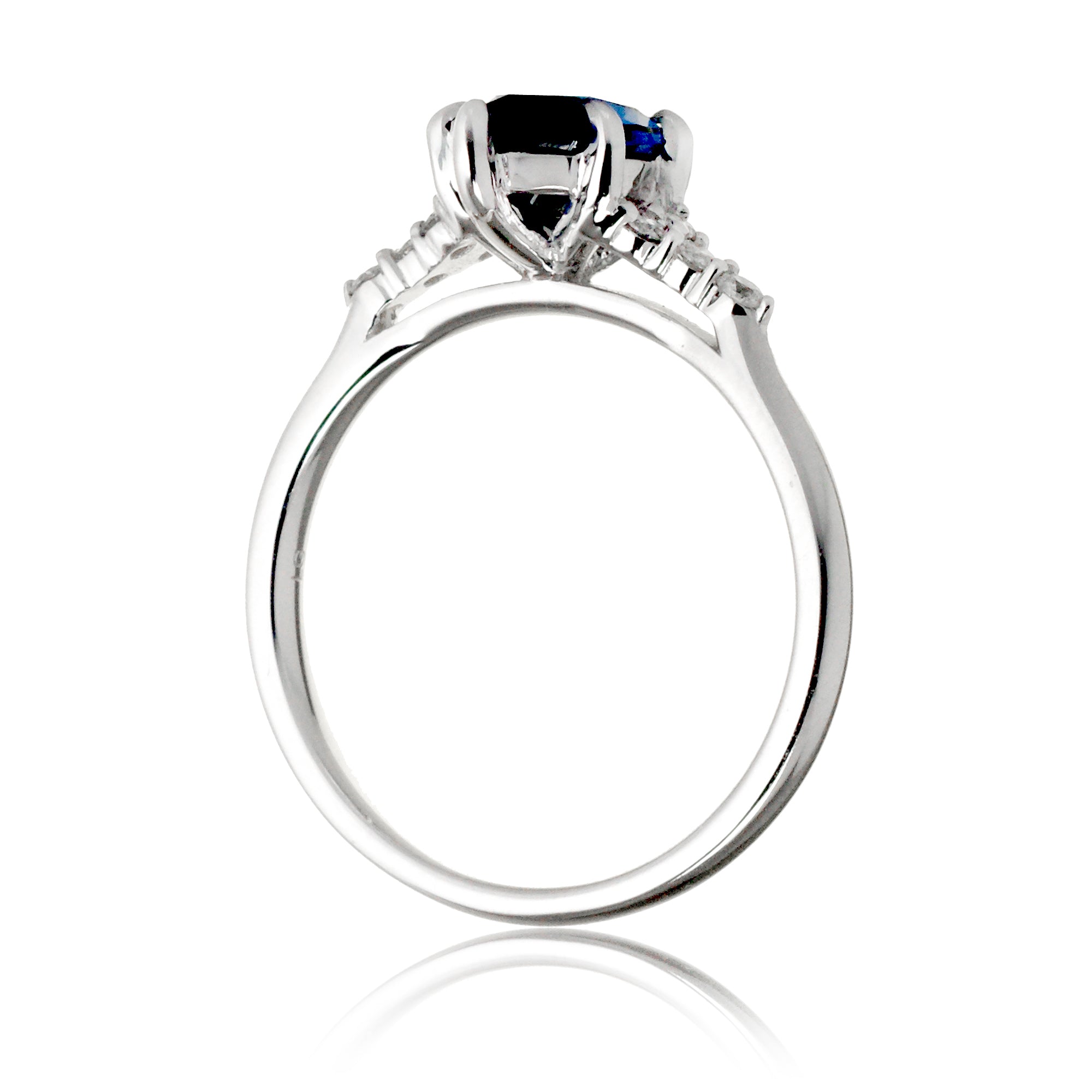 Marquise sapphire diamond three stone engagement ring in white gold