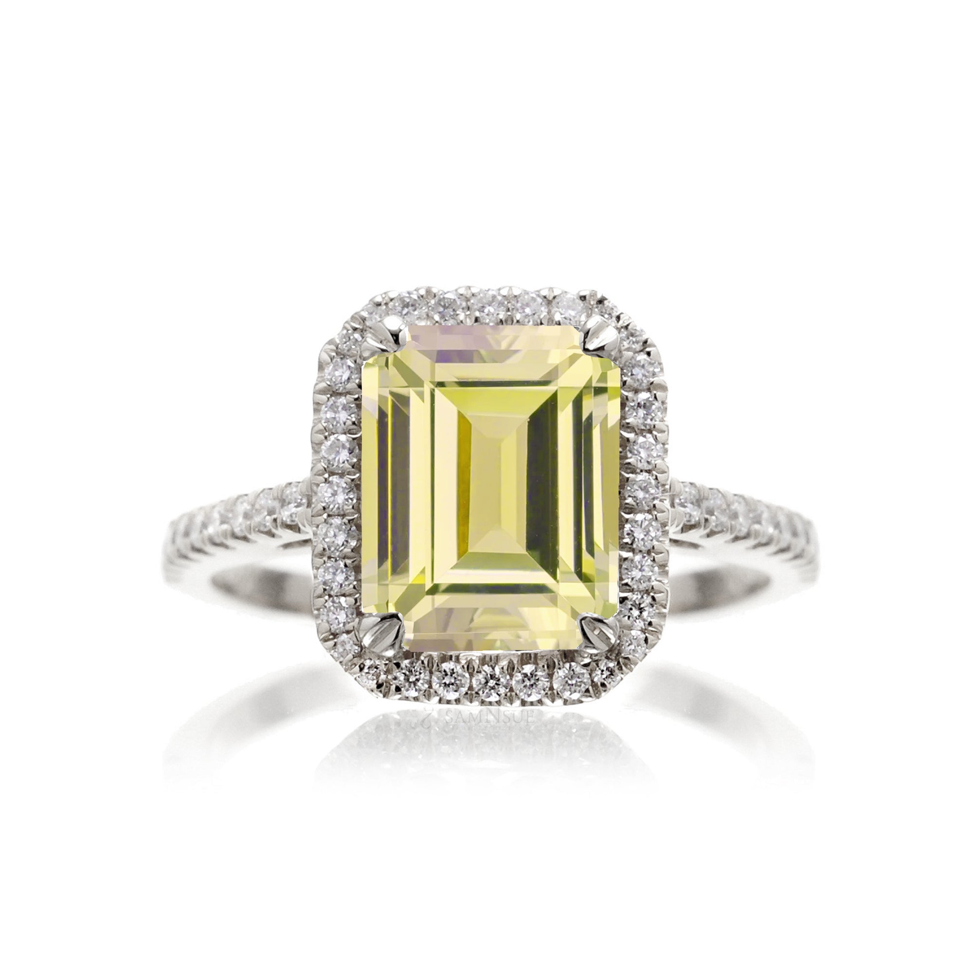 Yellow sapphire emerald cut ring with diamond halo