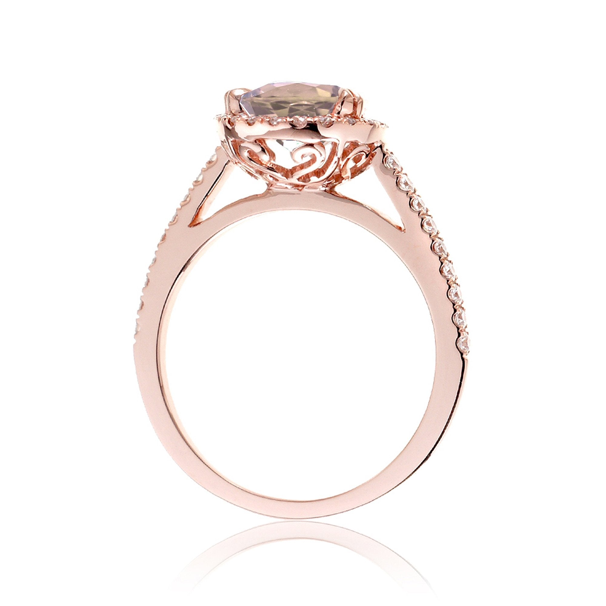 Oval morganite engagement ring with diamond halo in rose gold