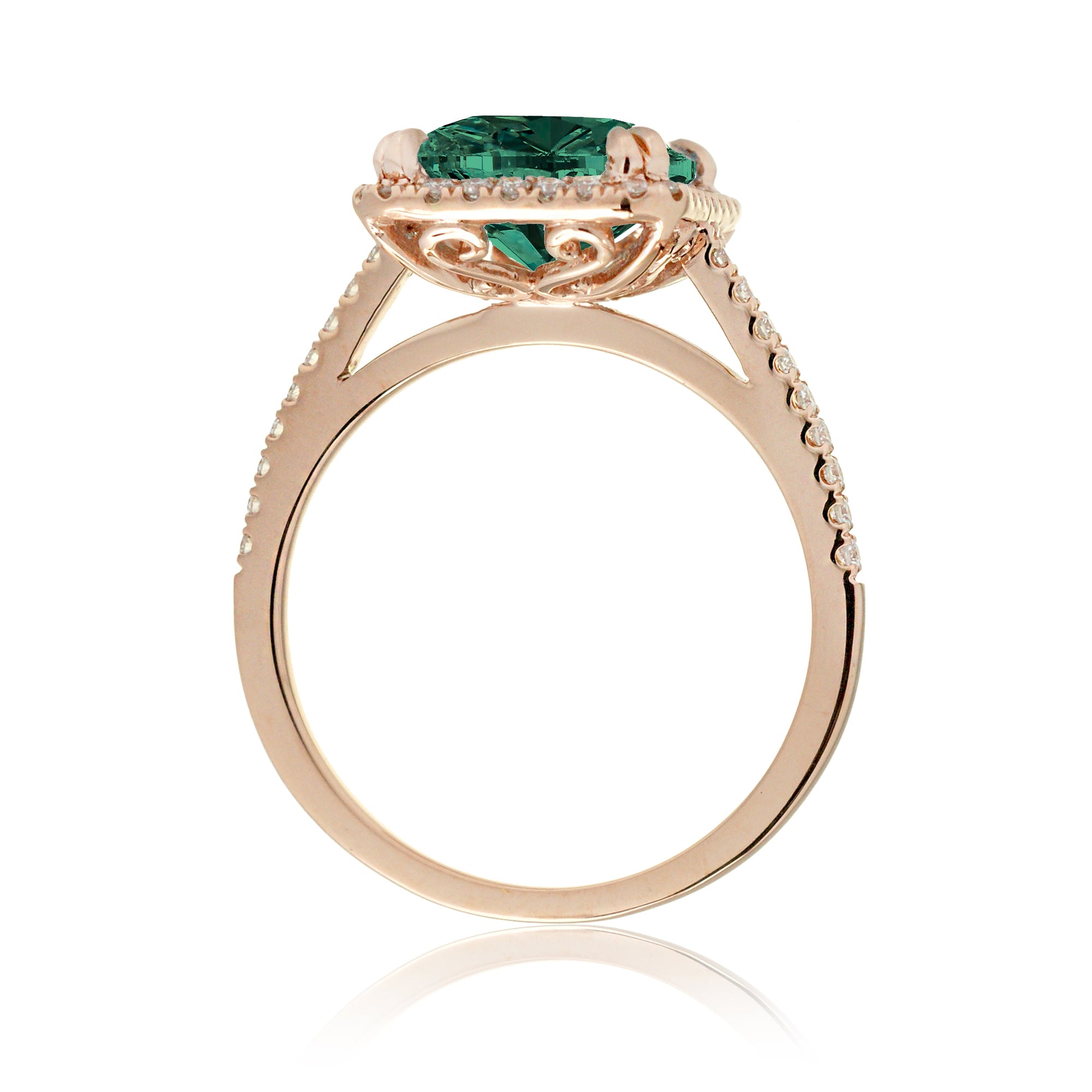 Cathedral setting in Rose gold with a green lab grown emerald