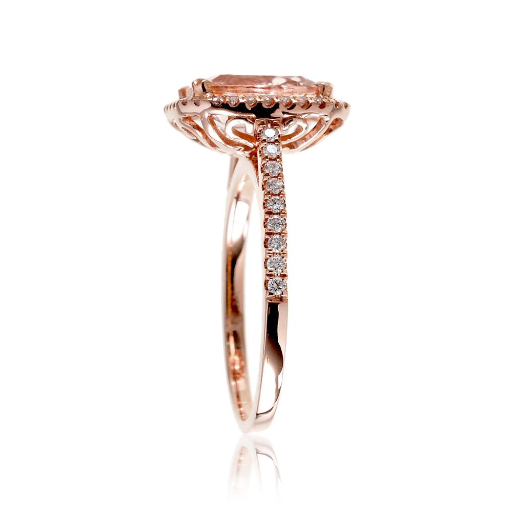 Cushion cut morganite ring with a diamond halo in rose gold