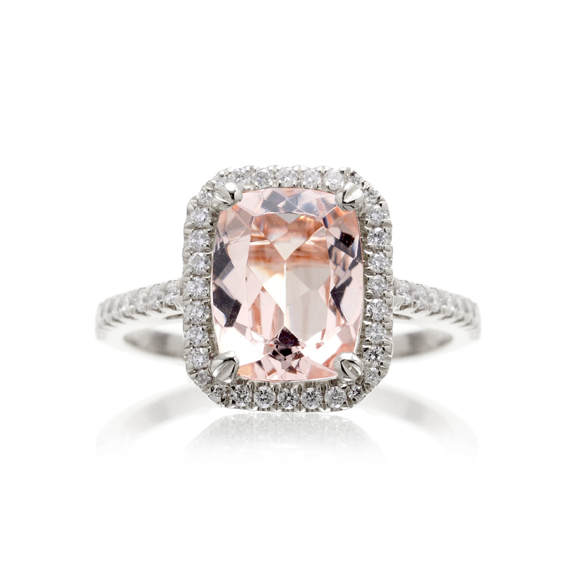 Cushion cut morganite ring with a diamond halo in white gold