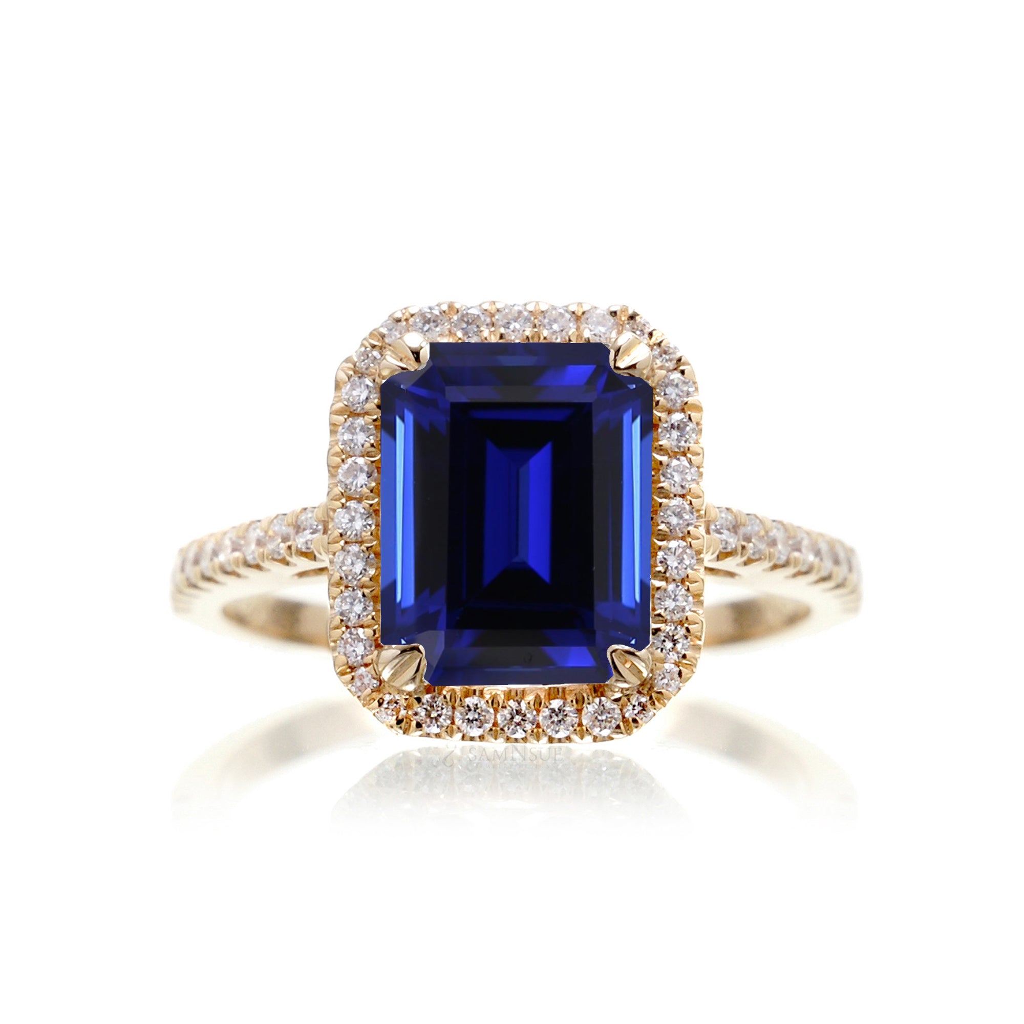 Blue sapphire and store emerald combination ring