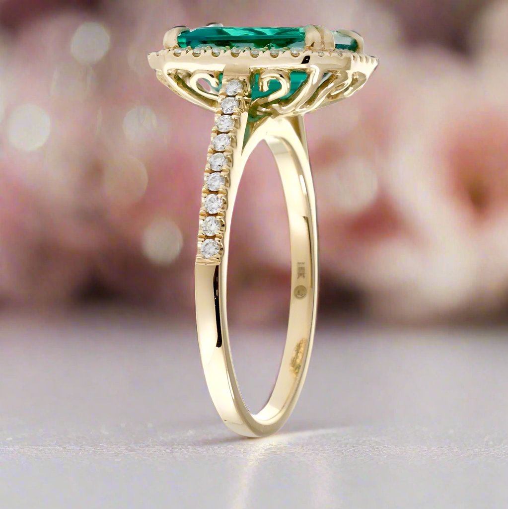 Emerald Cut Emerald With Diamond Halo Engagement Ring In Yellow Gold Cathedral Setting