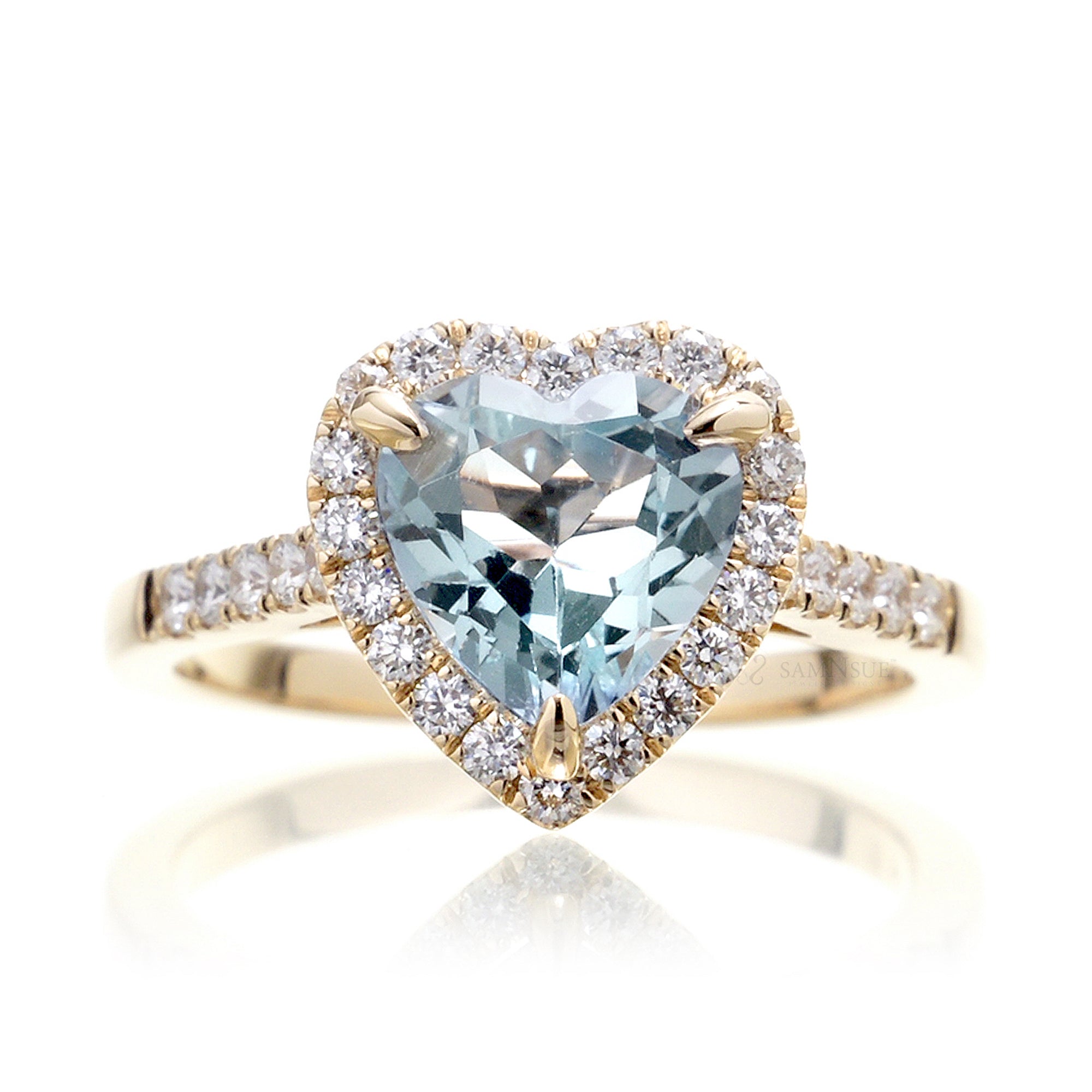 Heart aquamarine ring with diamond halo and band yellow gold