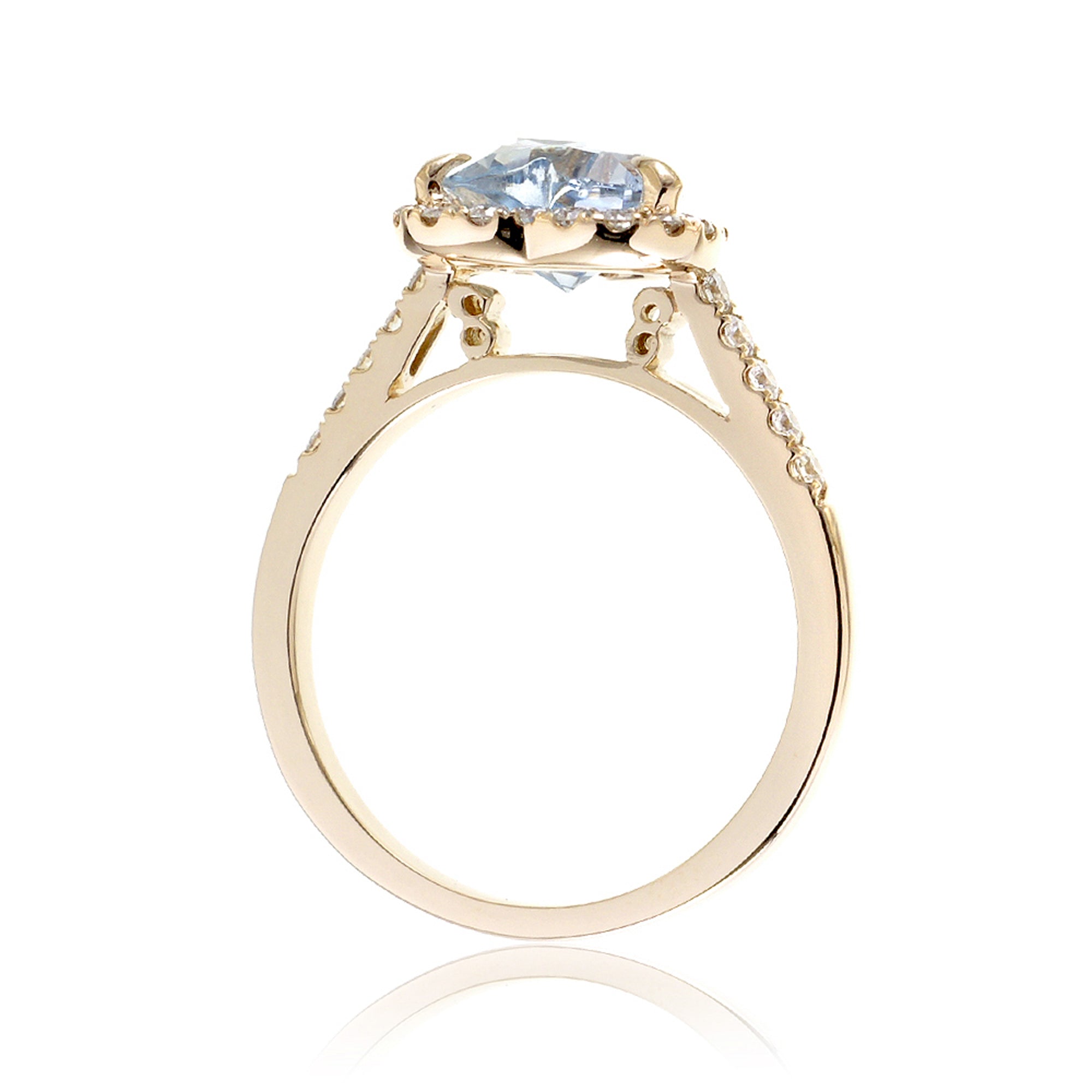 Heart aquamarine ring with diamond halo and band yellow gold