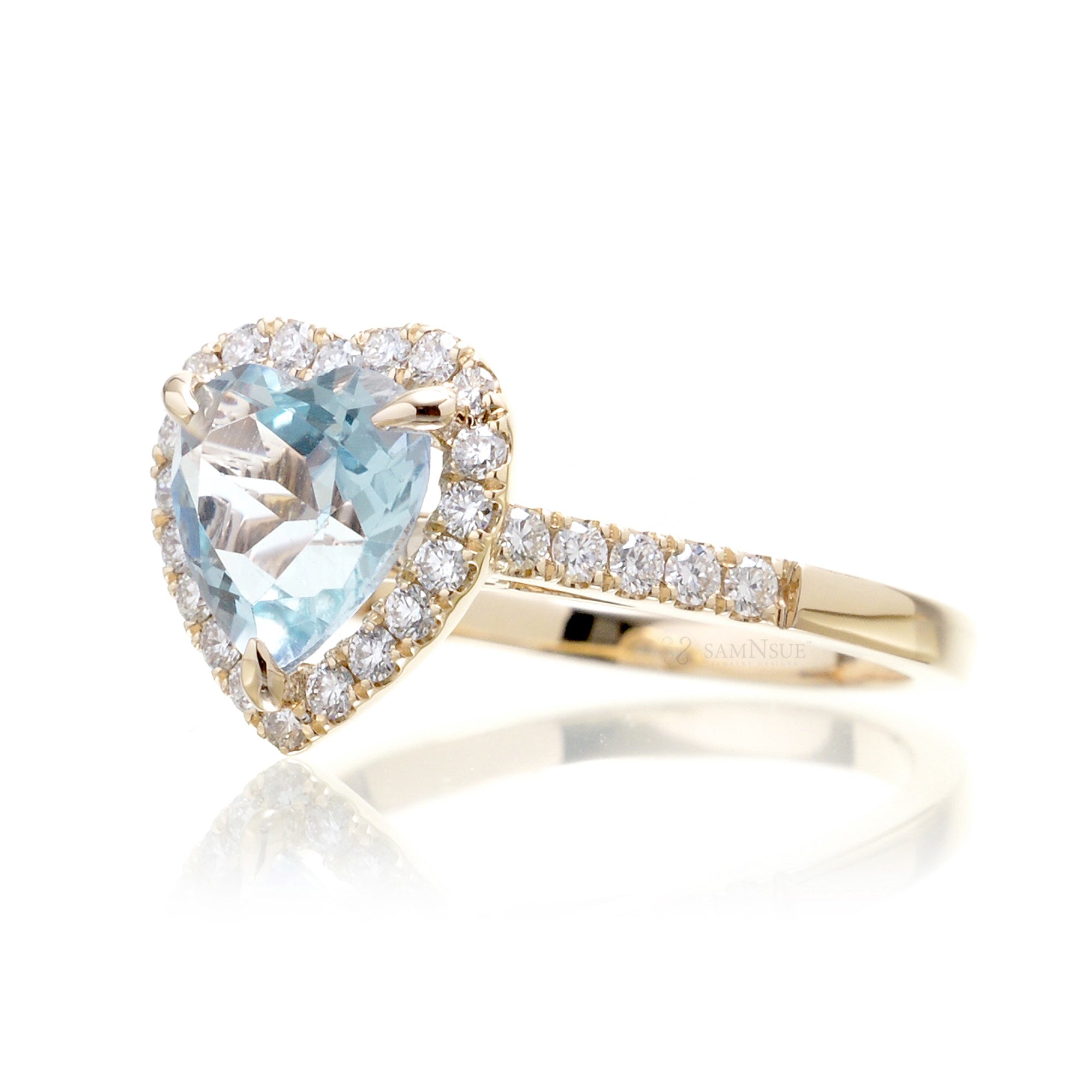 Heart aquamarine ring with diamond halo and band yellow gold