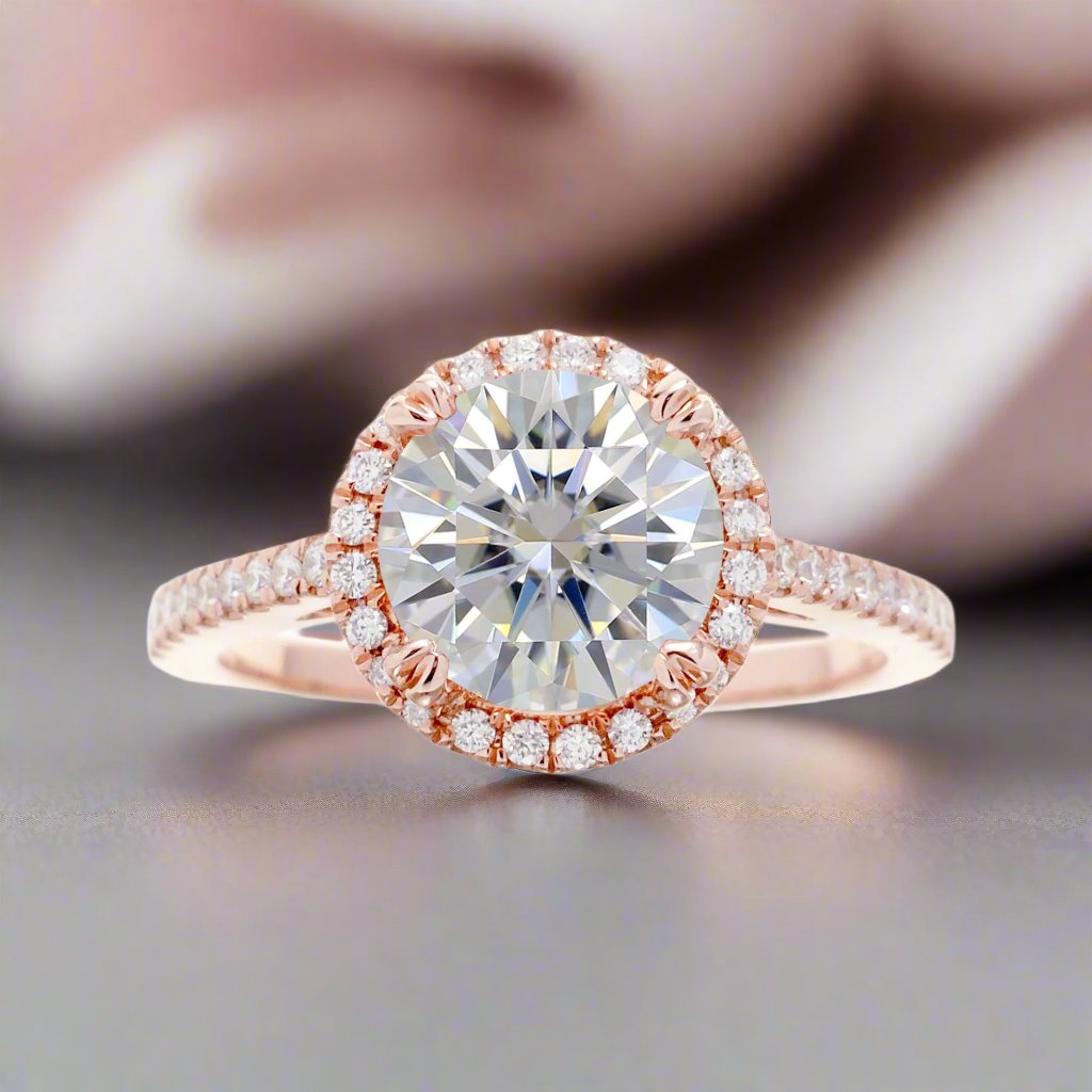 Round diamond engagement ring with halo in rose gold