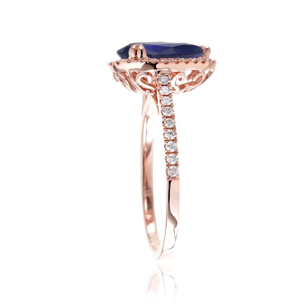 Pear sapphire engagement ring in rose gold