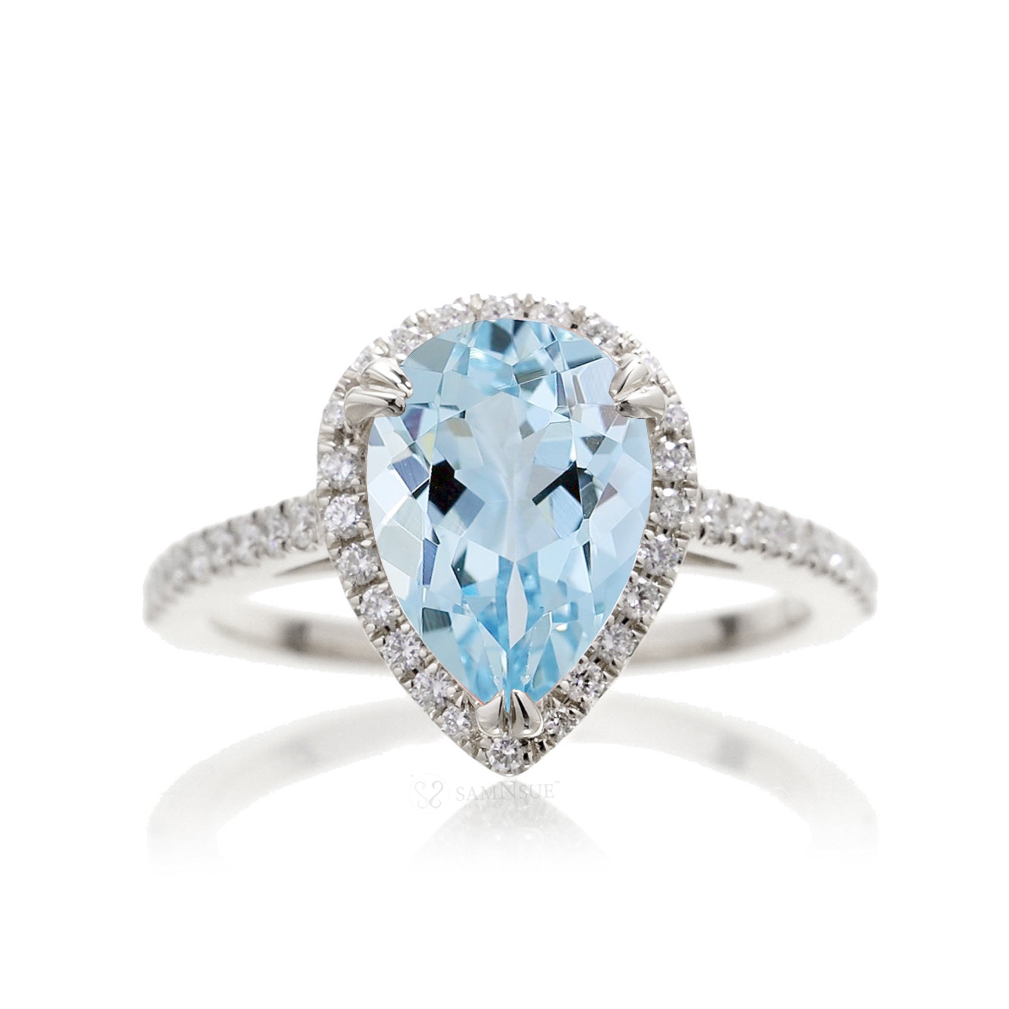 Pear aquamarine engagement ring with halo in white gold