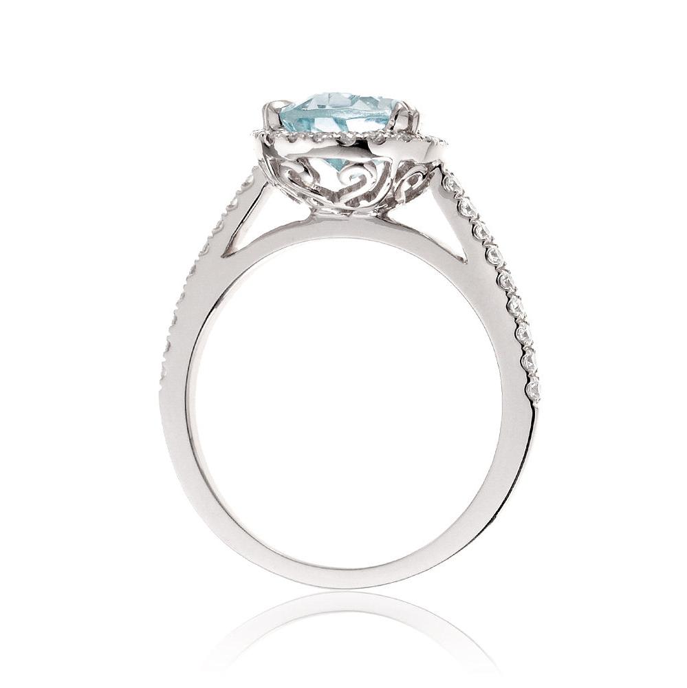 Pear aquamarine engagement ring with halo in white gold