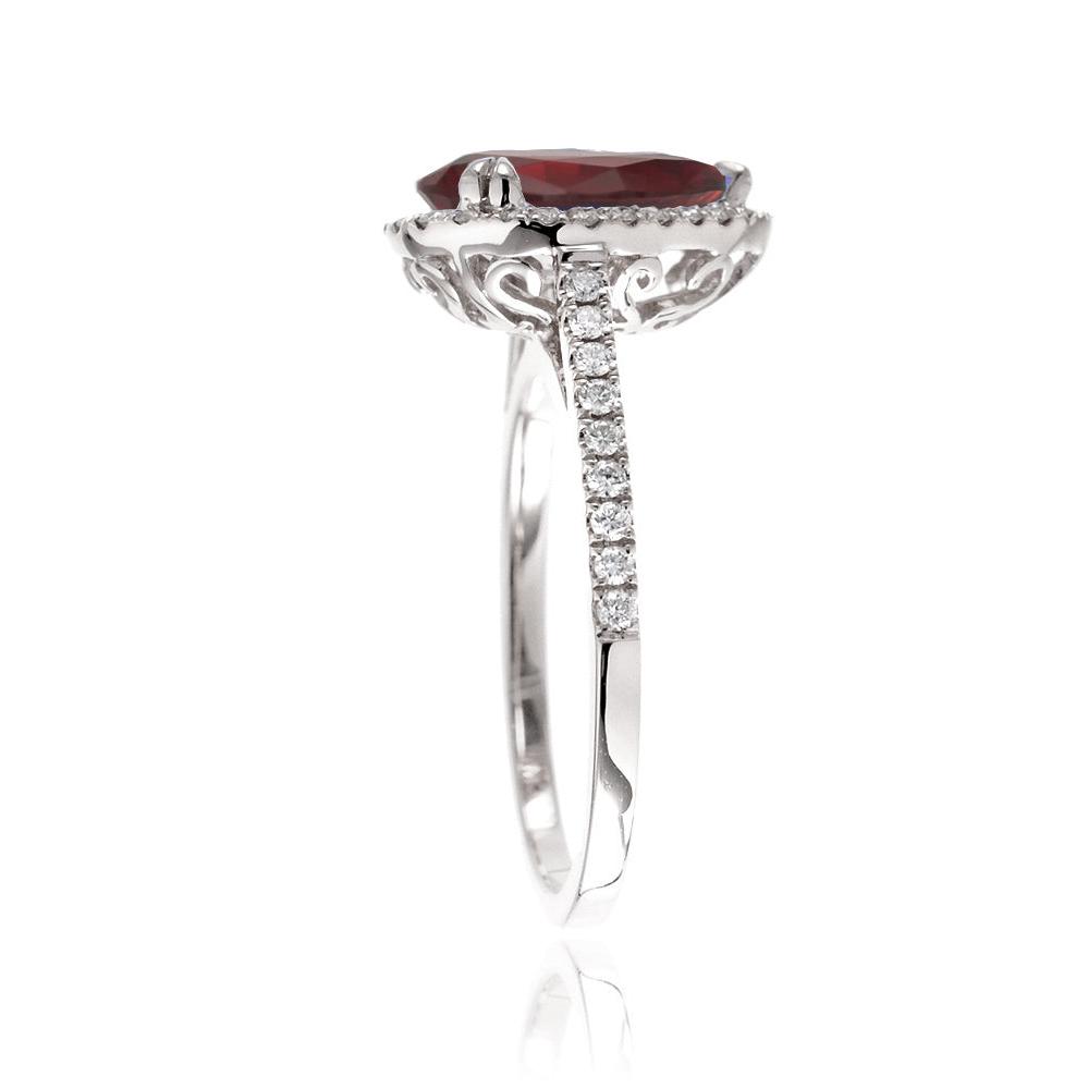 Pear ruby engagement ring in white gold