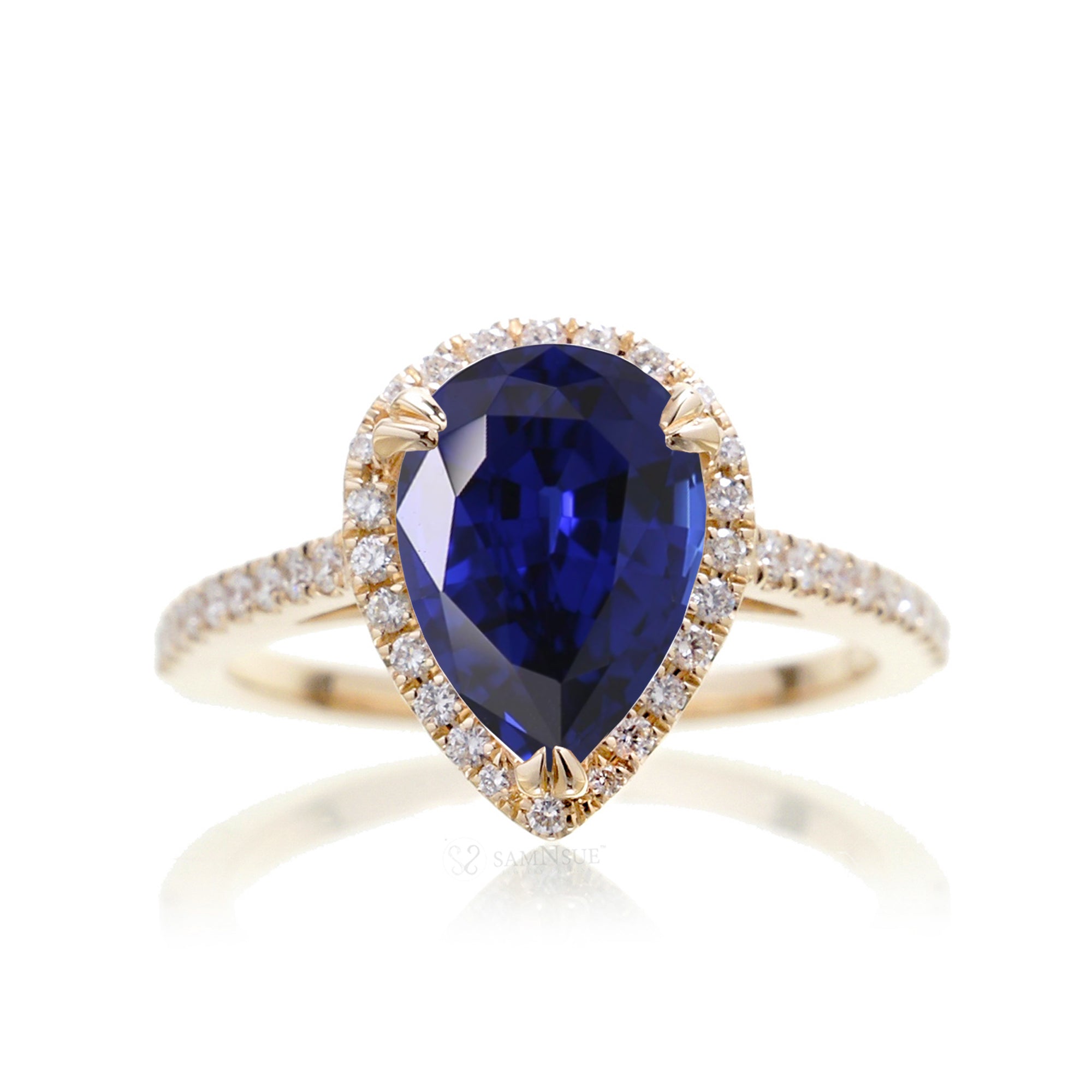 Pear sapphire engagement ring in yellow gold