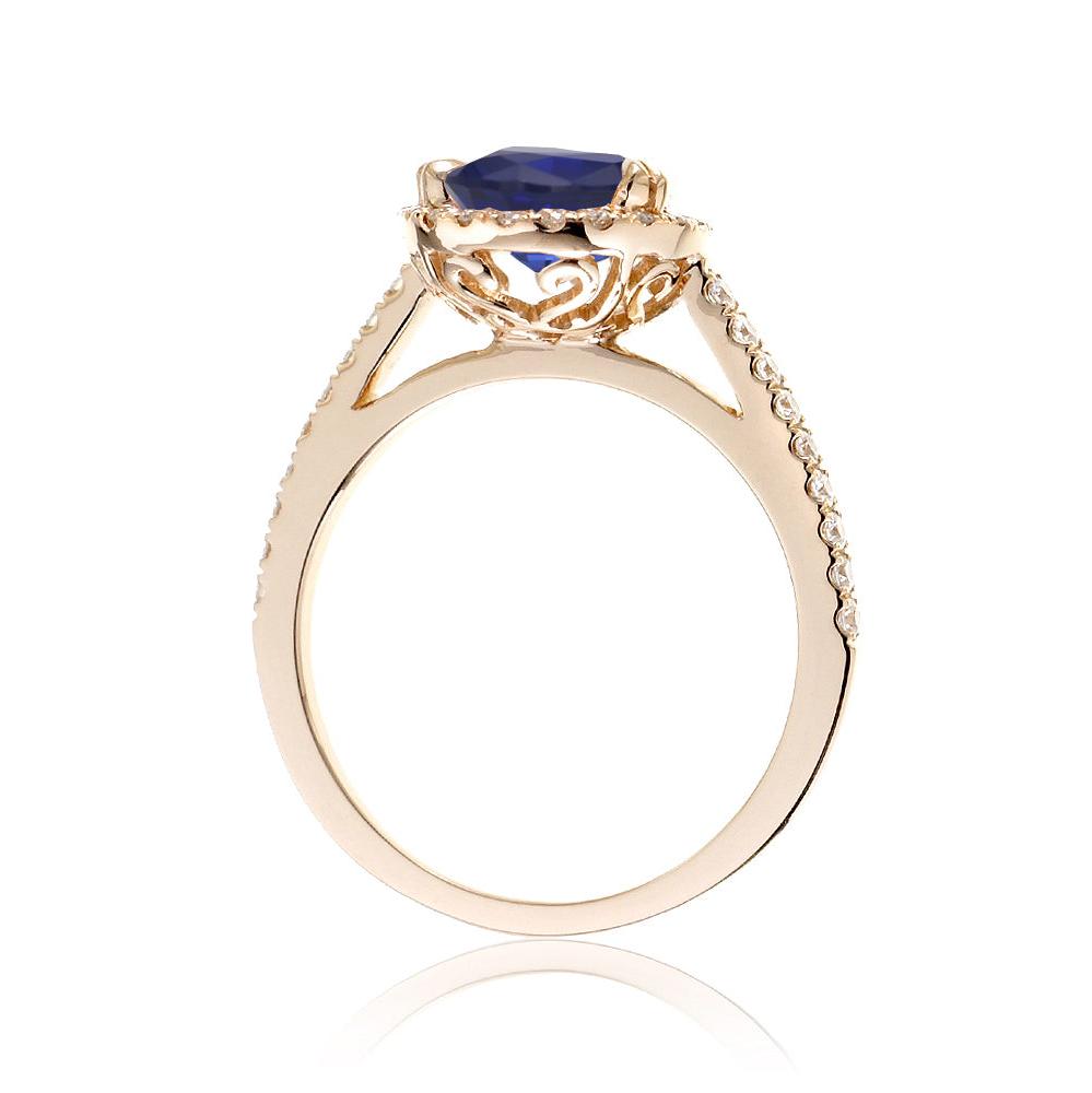 Pear sapphire engagement ring in yellow gold