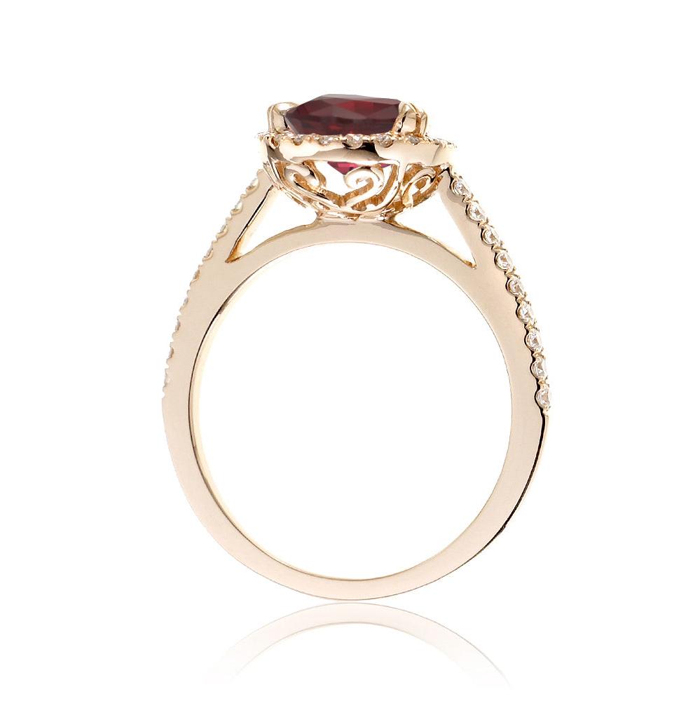 Ruby engagement ring round diamond halo in yellow gold