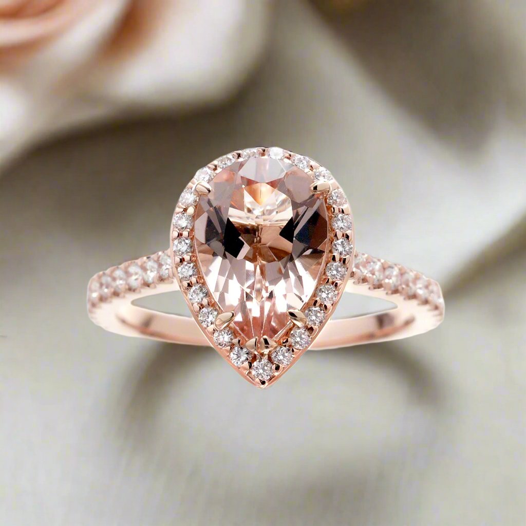 Pear cut morganite ring with diamond halo and band in the Sunset rose gold